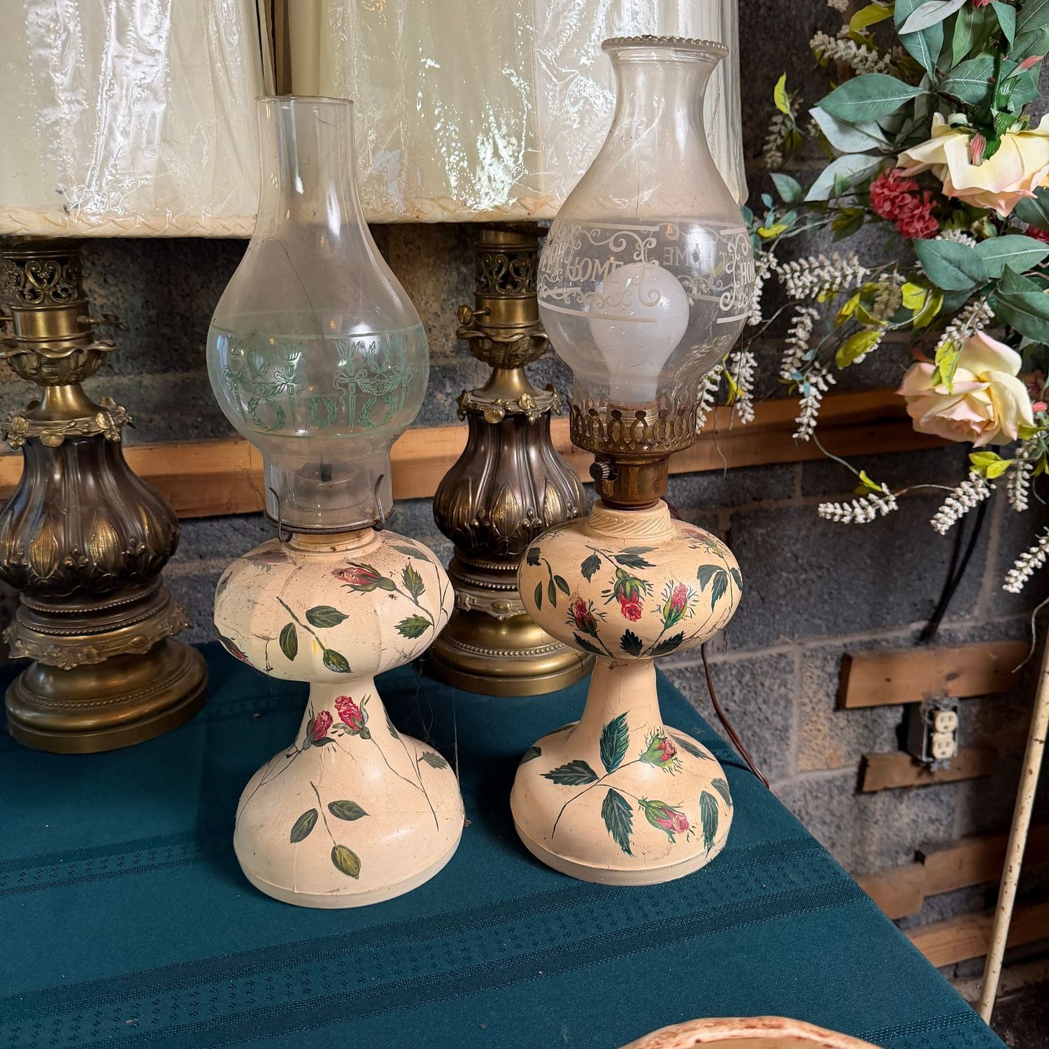 Two glass lanterns with hand-painted roses, one has been converted to electric but needs re-wired, 18"-20"