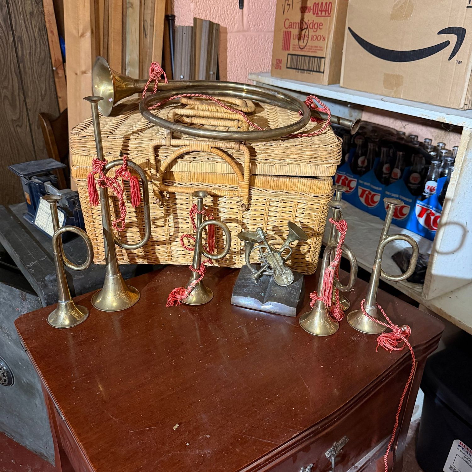 Group of decorative brass horns in a wicker basket (one handle needs repair). The horns are in nice shape, plus there's a horn & violin paperweight