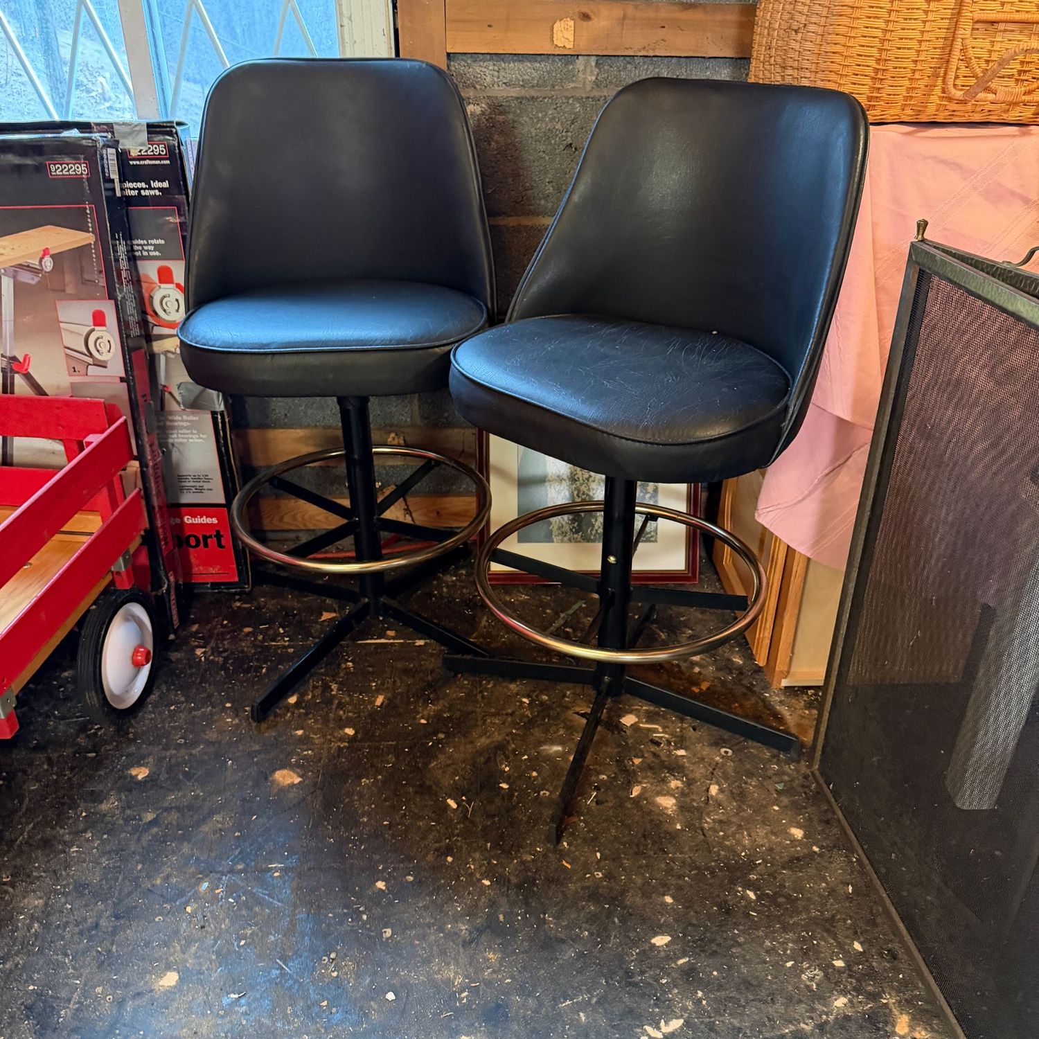 Pair of vintage black vinyl bar stools, needs some cleaning, the legs in good condition but may have some spots of worn paint or oxidation 38"H x 17"W
