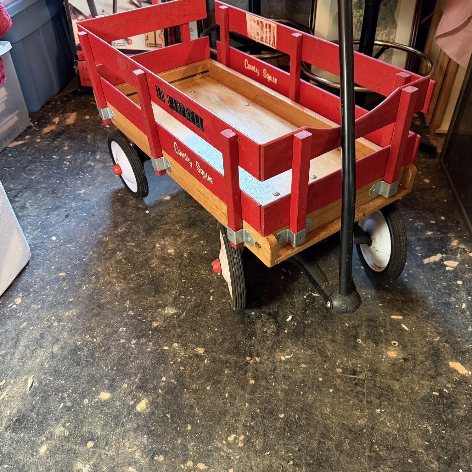 Country Squire wooden wagon with metal wheels, removable sides, a few personalized stickers, 32"L x 16"W (This item is heavy & in the lower level)
