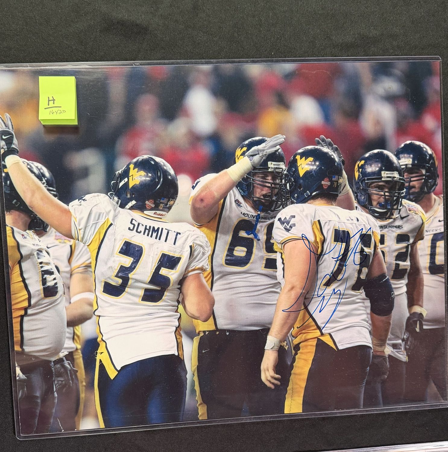 Autographed 16x20 H: Dan Mozes