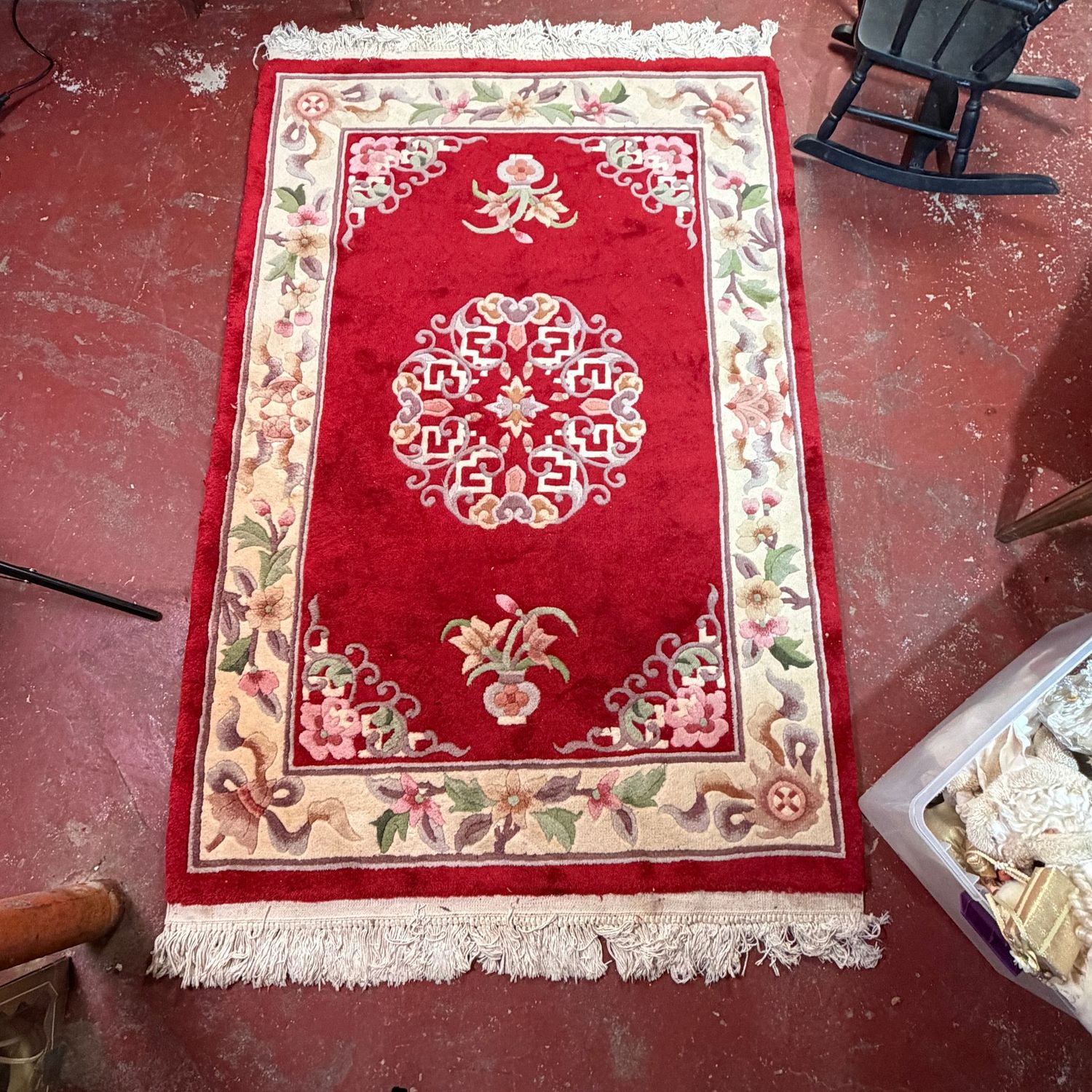 Red and cream oriental rug with fringe, shows minor wear, needs some cleaning, but overall in good condition, 5'10" x 3'11"
