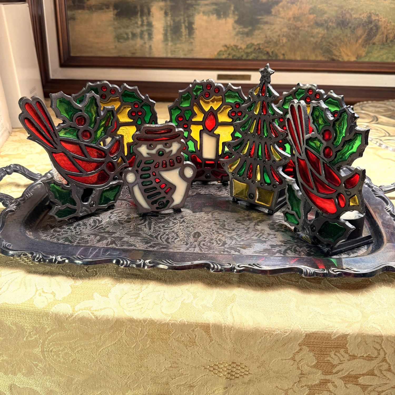 Large silver-plated tray with 7 heavy stained glass votive candle holders, the tallest is 6.5"H, the tray is 25"L