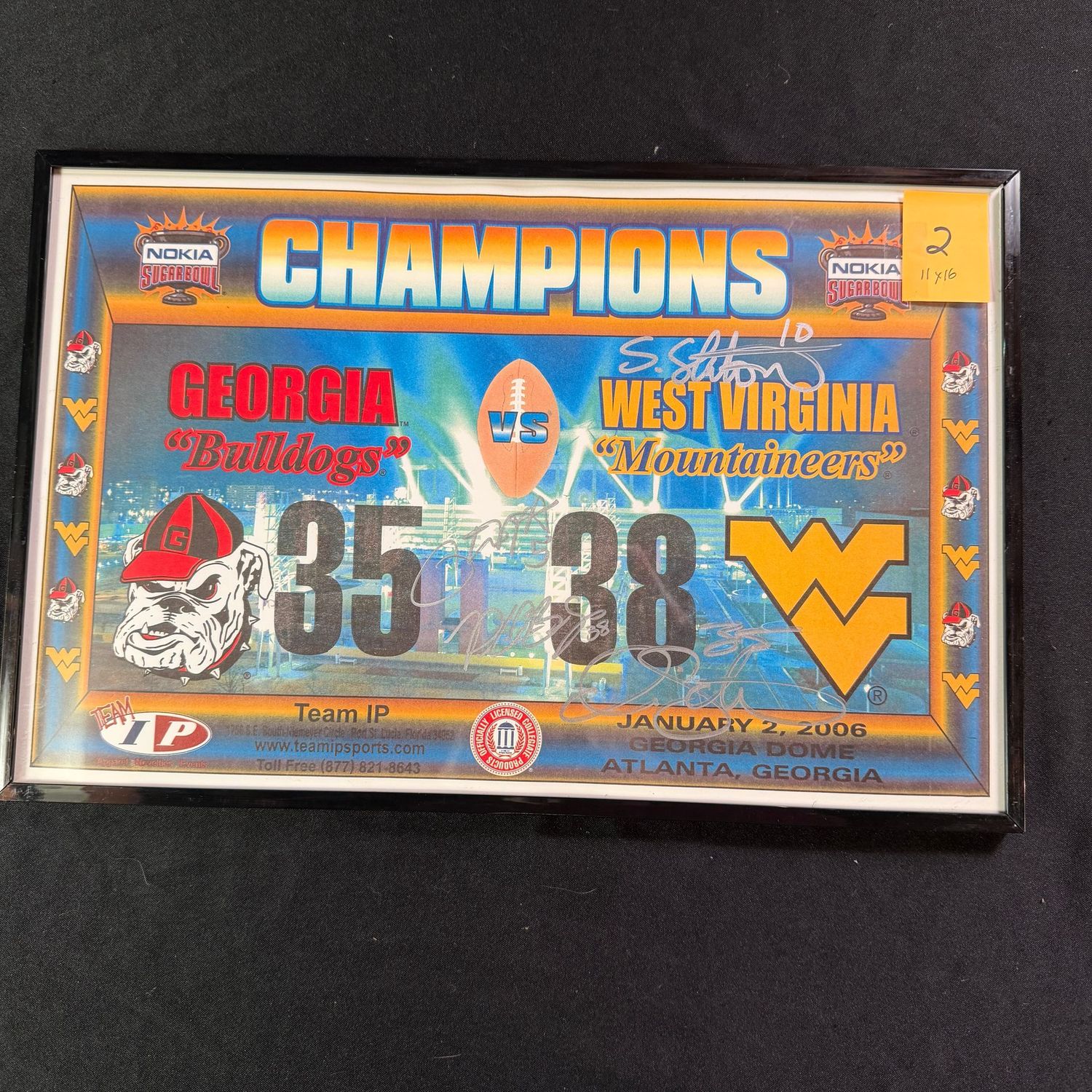 Framed poster 11x16 #2, Nokia Sugarbowl, 2006, minor bump to top right corner of frame, signed by Pat White, Owen Schmitt, & Steve Slaton