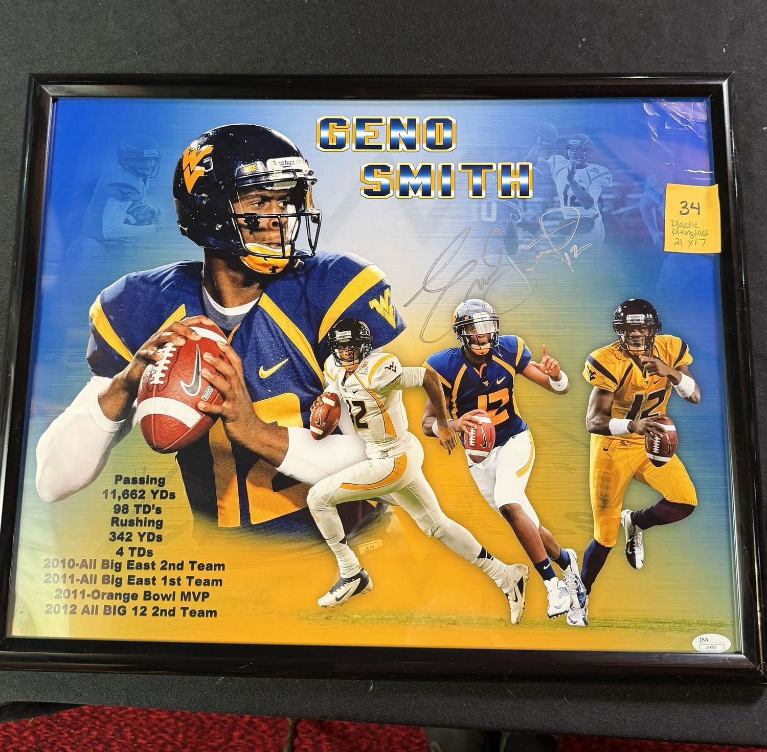 Framed & Signed (plastic w/plexiglass) 21x17, #34, JSA certified, minor tear to poster edge, Geno Smith