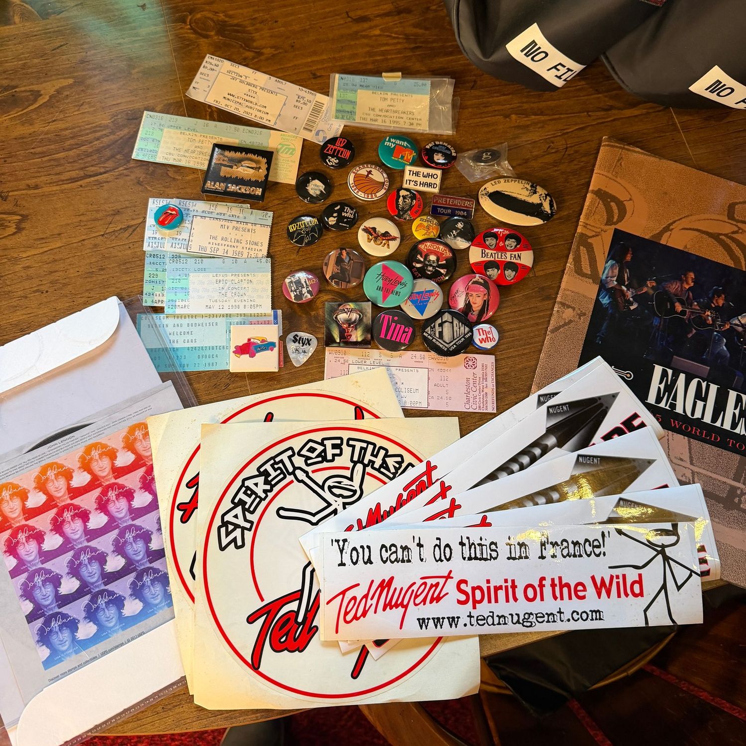 Rock & Roll memorabilia lot with ticket stubs, pins, program