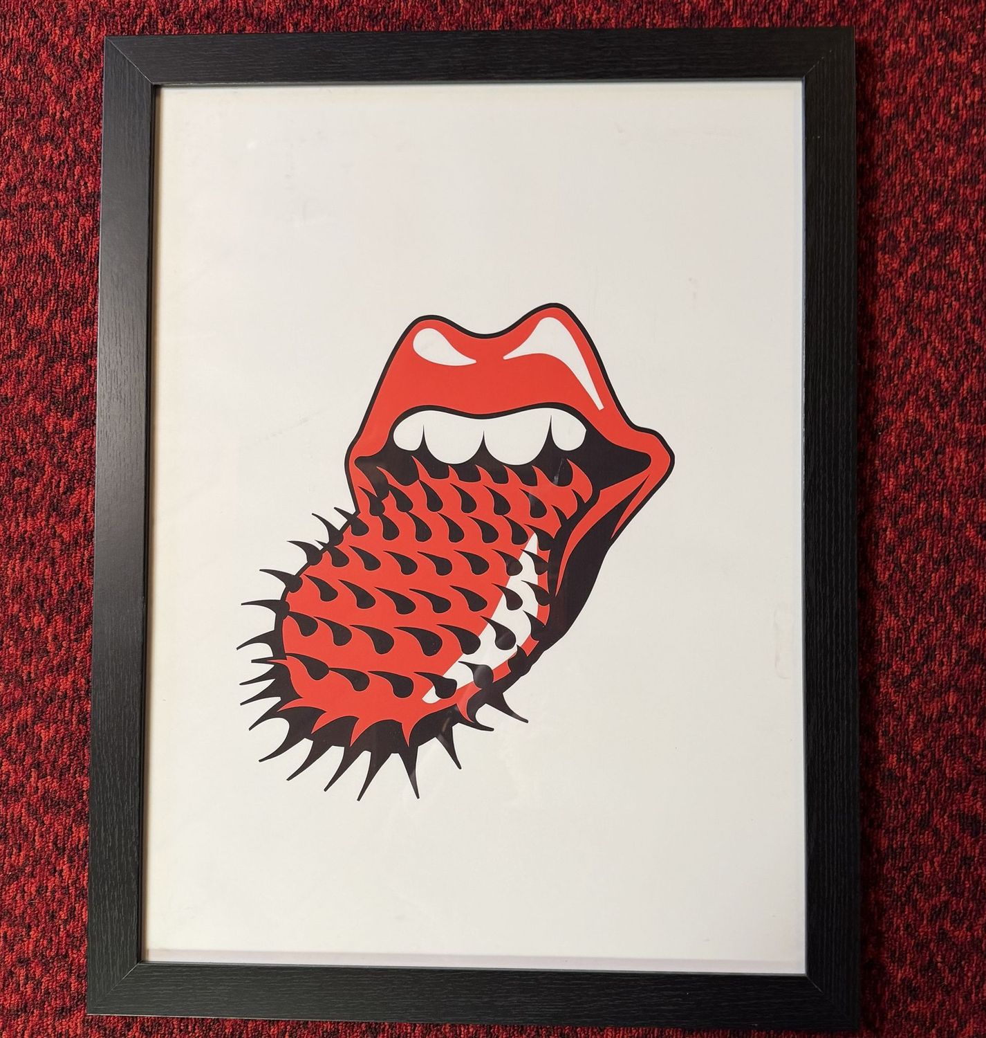 Rolling Stones framed poster 27" x 20", red spiked tongue