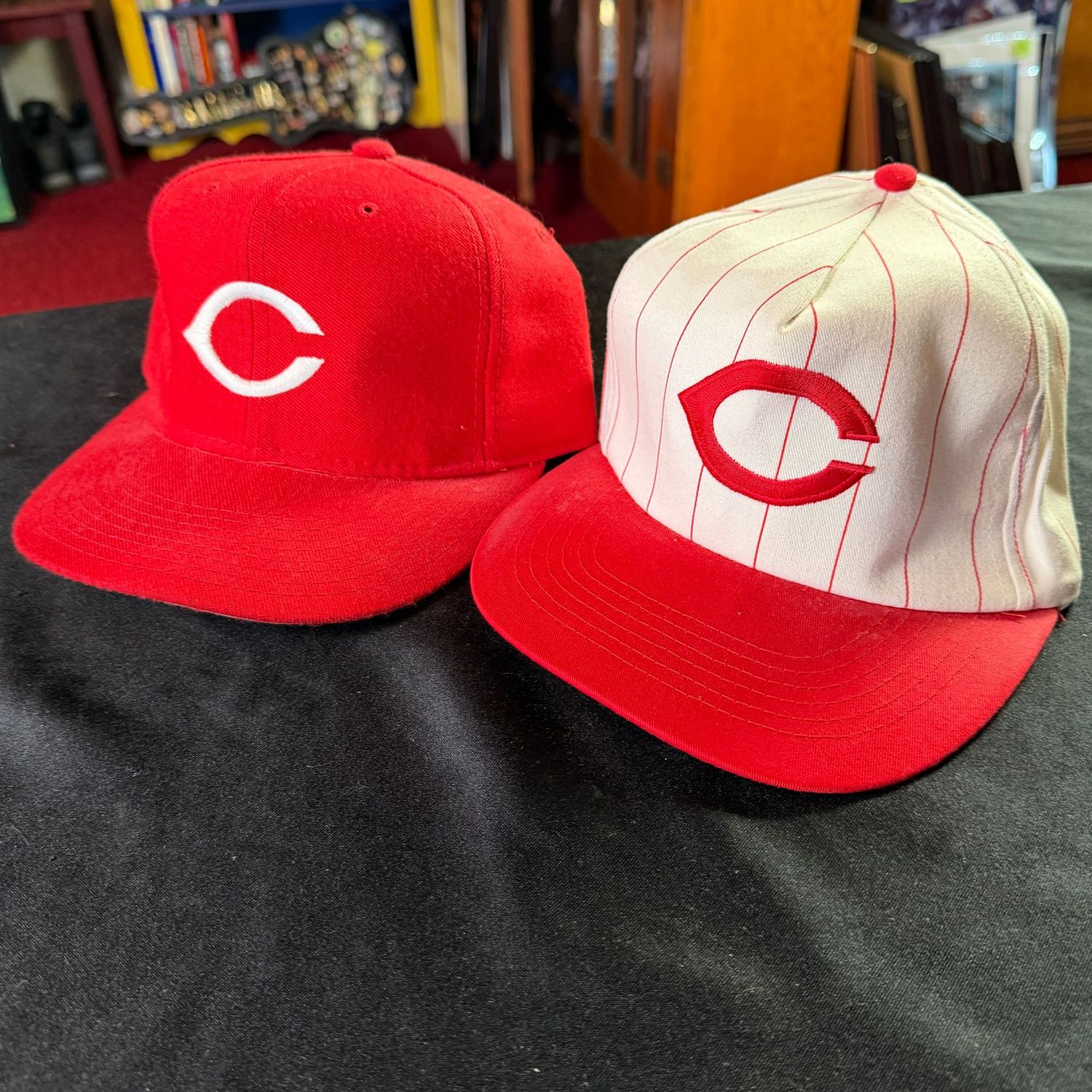 Two Cincinnati Reds baseball hats, good condition
