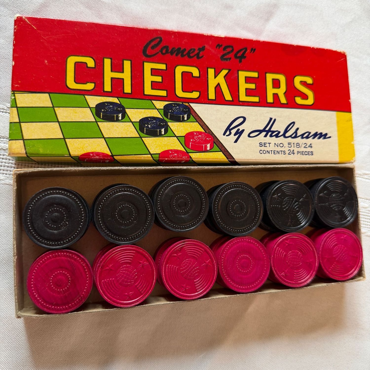 Box of Comet 24 wood checkers