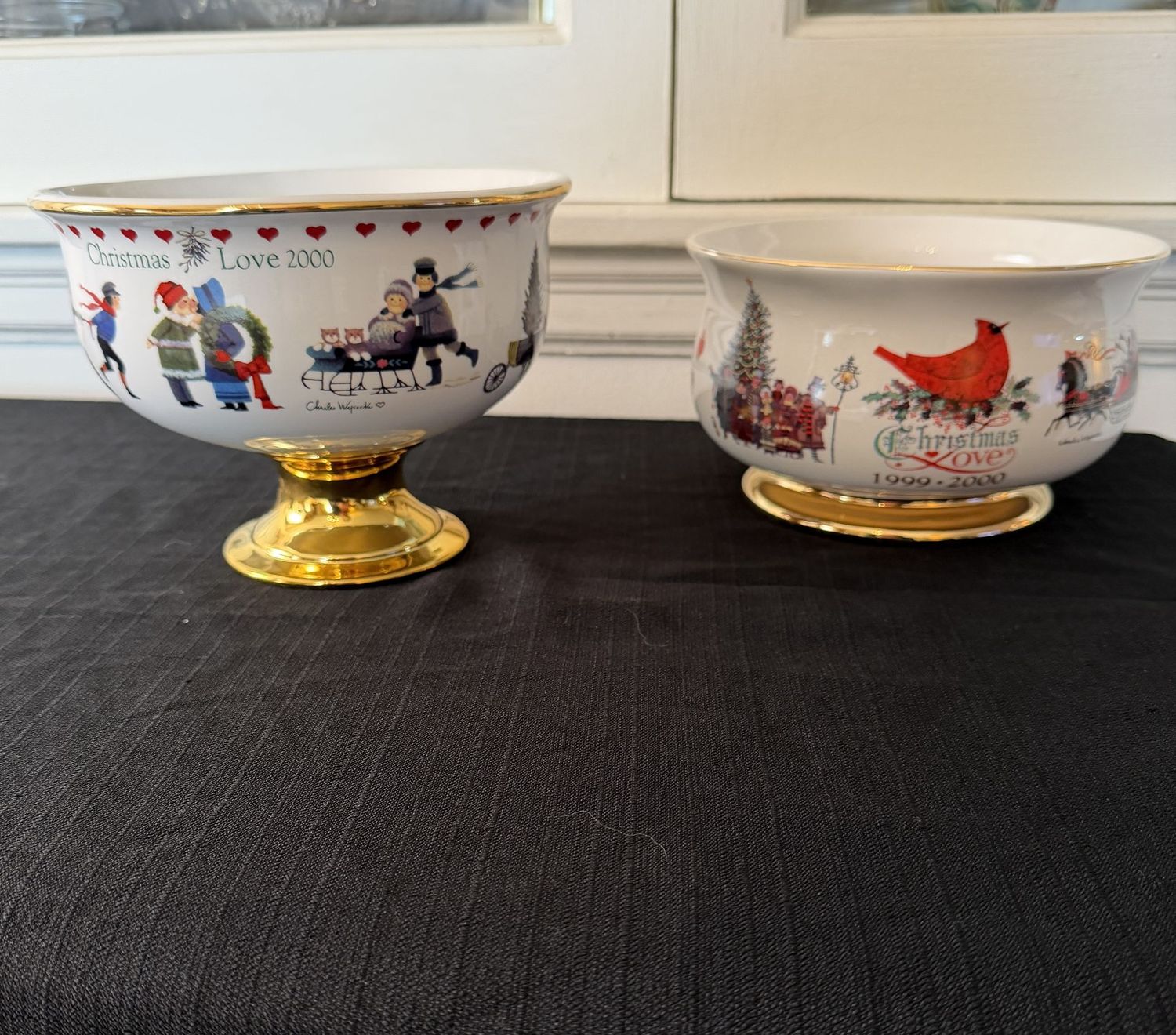 Two Charles Wysocki Teleflora ceramic Christmas centerpiece bowls, 7.5"W