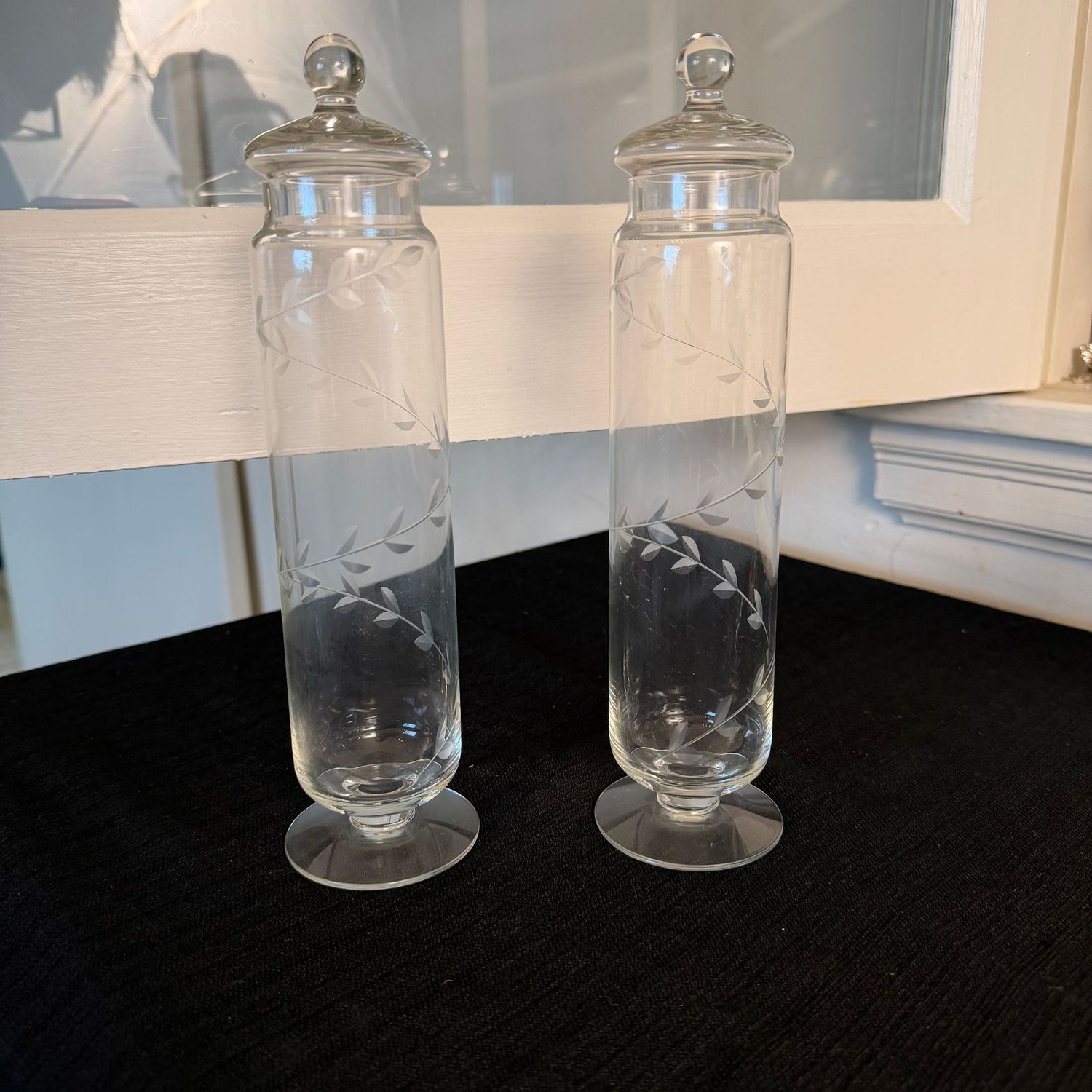 Pair of tall & slender etched crystal apothecary jars, 10"