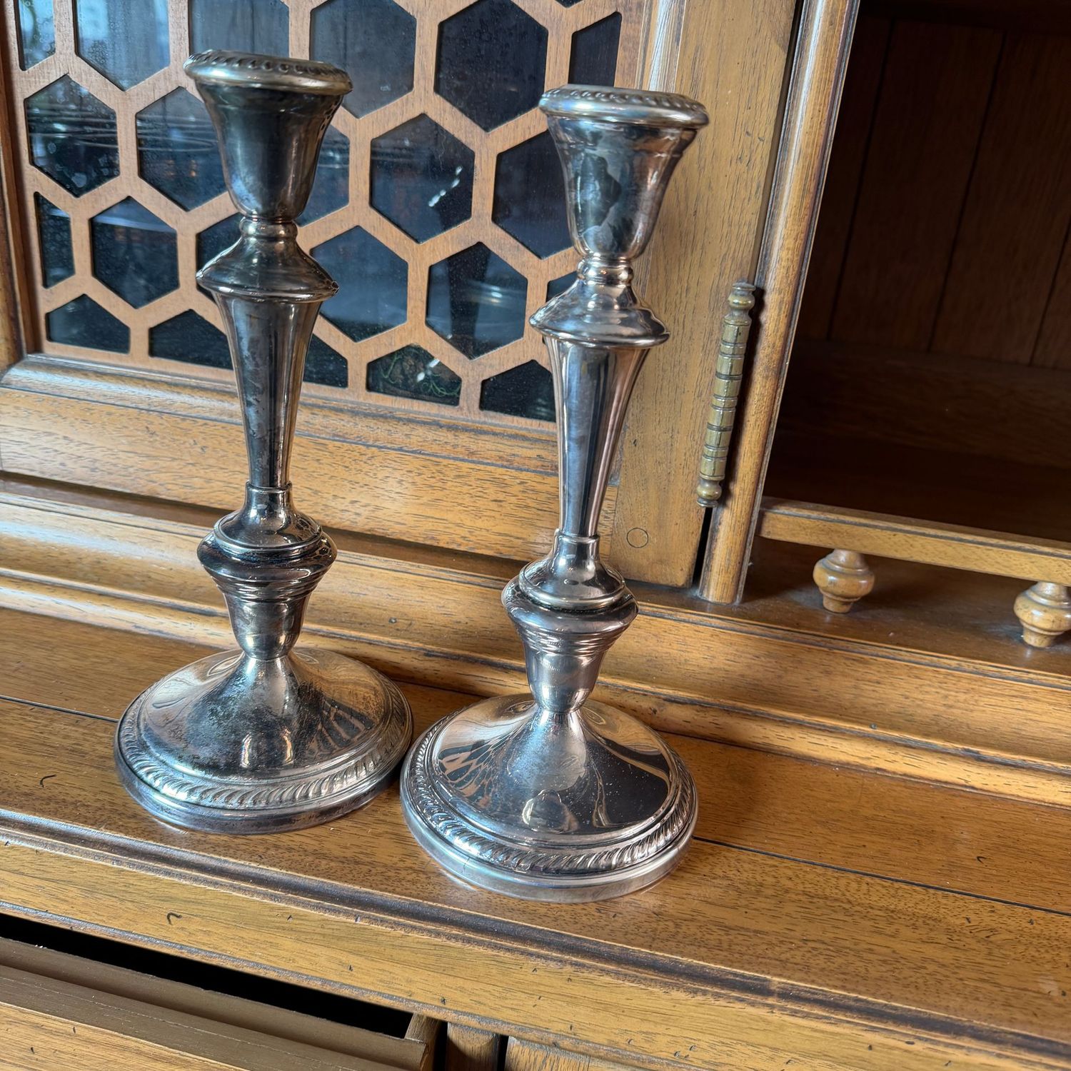 Pair of tall silver-plated candlesticks, 11"