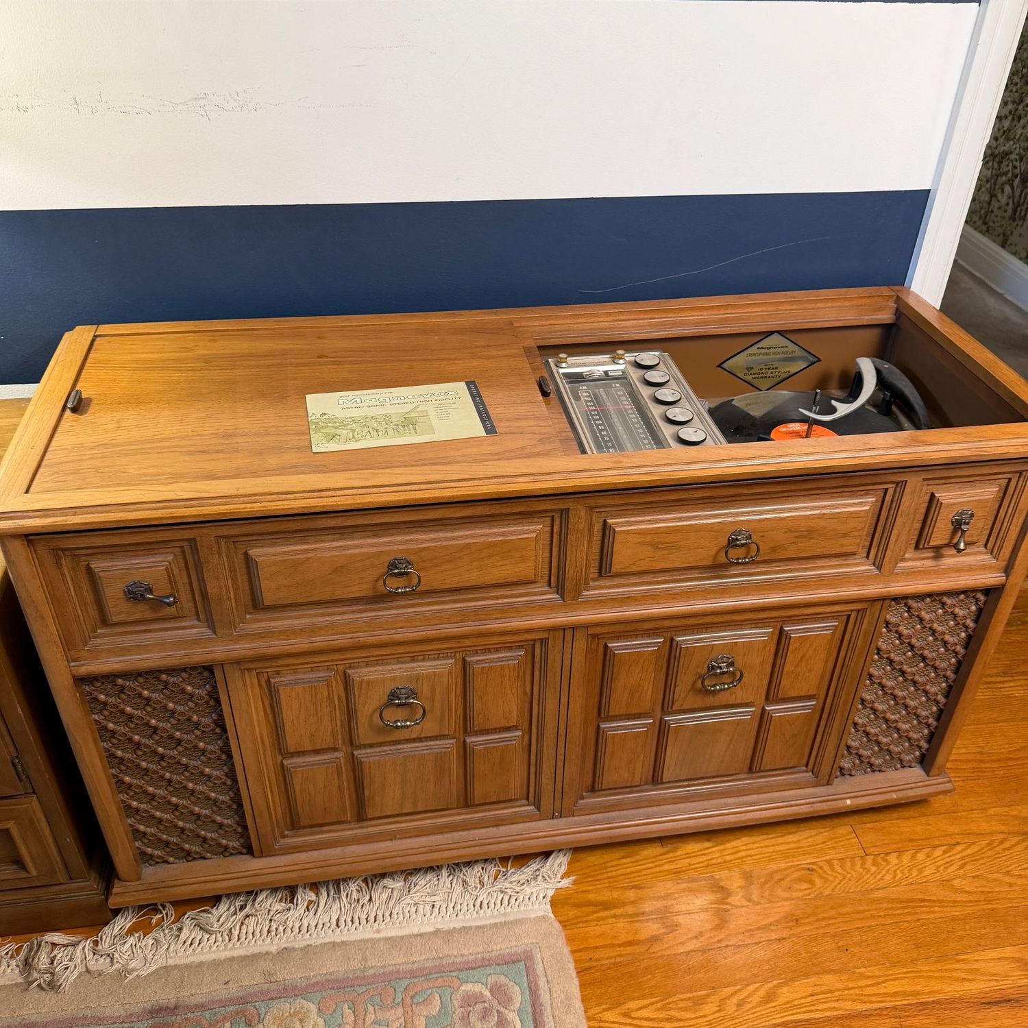 Console Magnavox stereo cabinet, radio works well, turntable spins, needs some work, 26"H x 19"D x 50"L