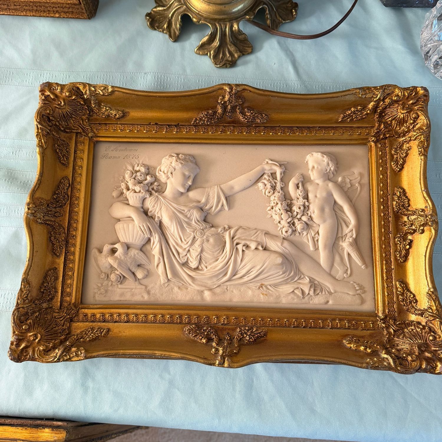 Neoclassical-style relief plaque, likely a cast in marble or alabaster, ornate gold frame, 12" x 16"