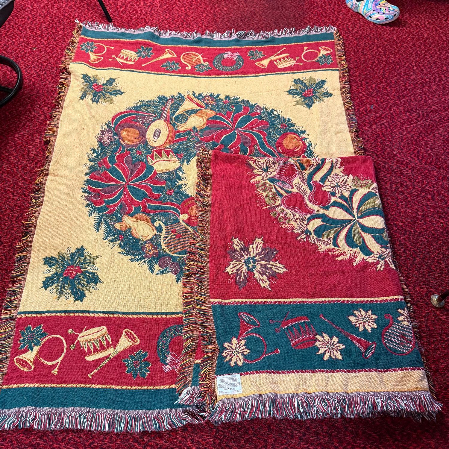 Pair of Christmas wreath throw blankets (may need spot treatment)