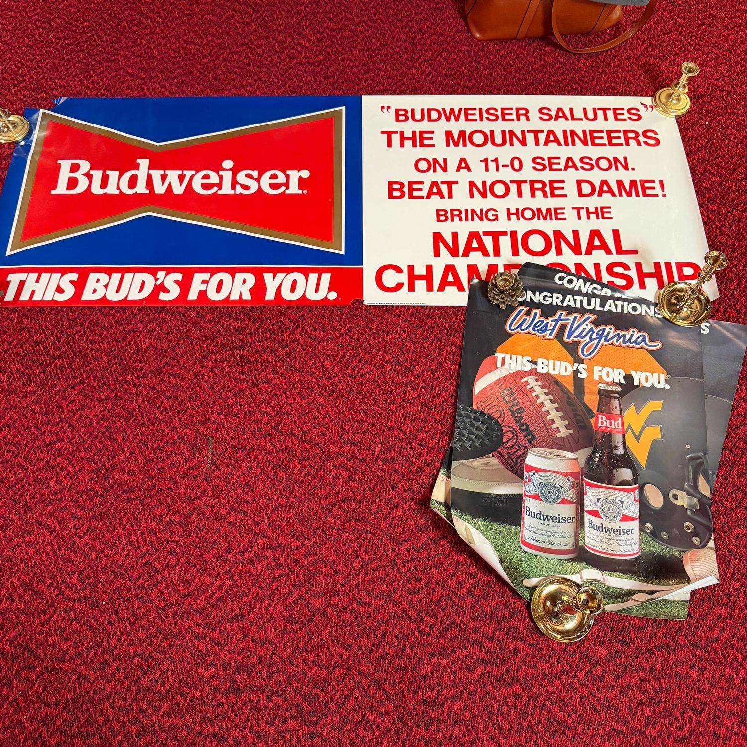 Poster #7 WVU Budweiser championship, the large one has a small tear near the bottom, the poster measures 4'8"L x 21"H