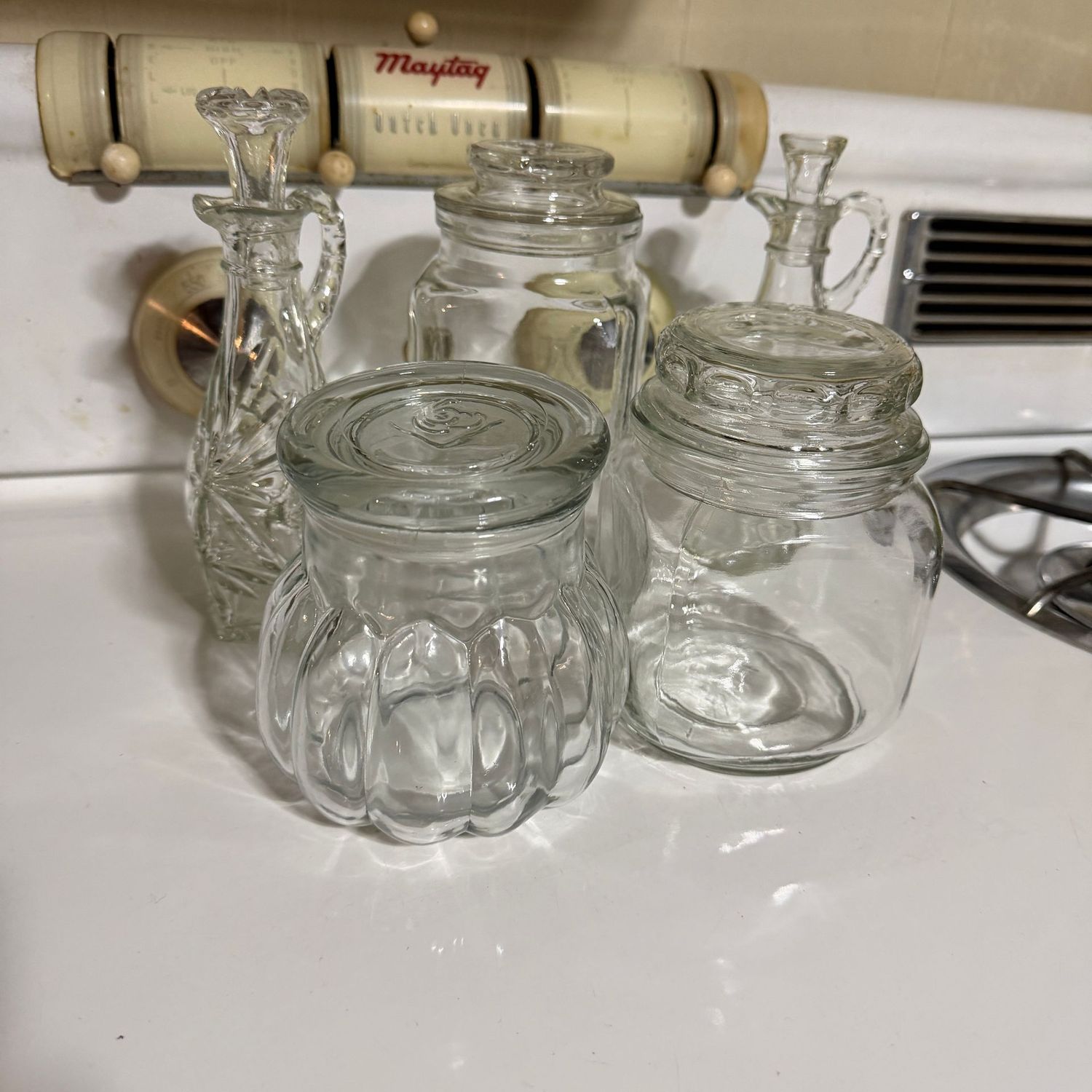 Group of vintage glass small canisters and cruets