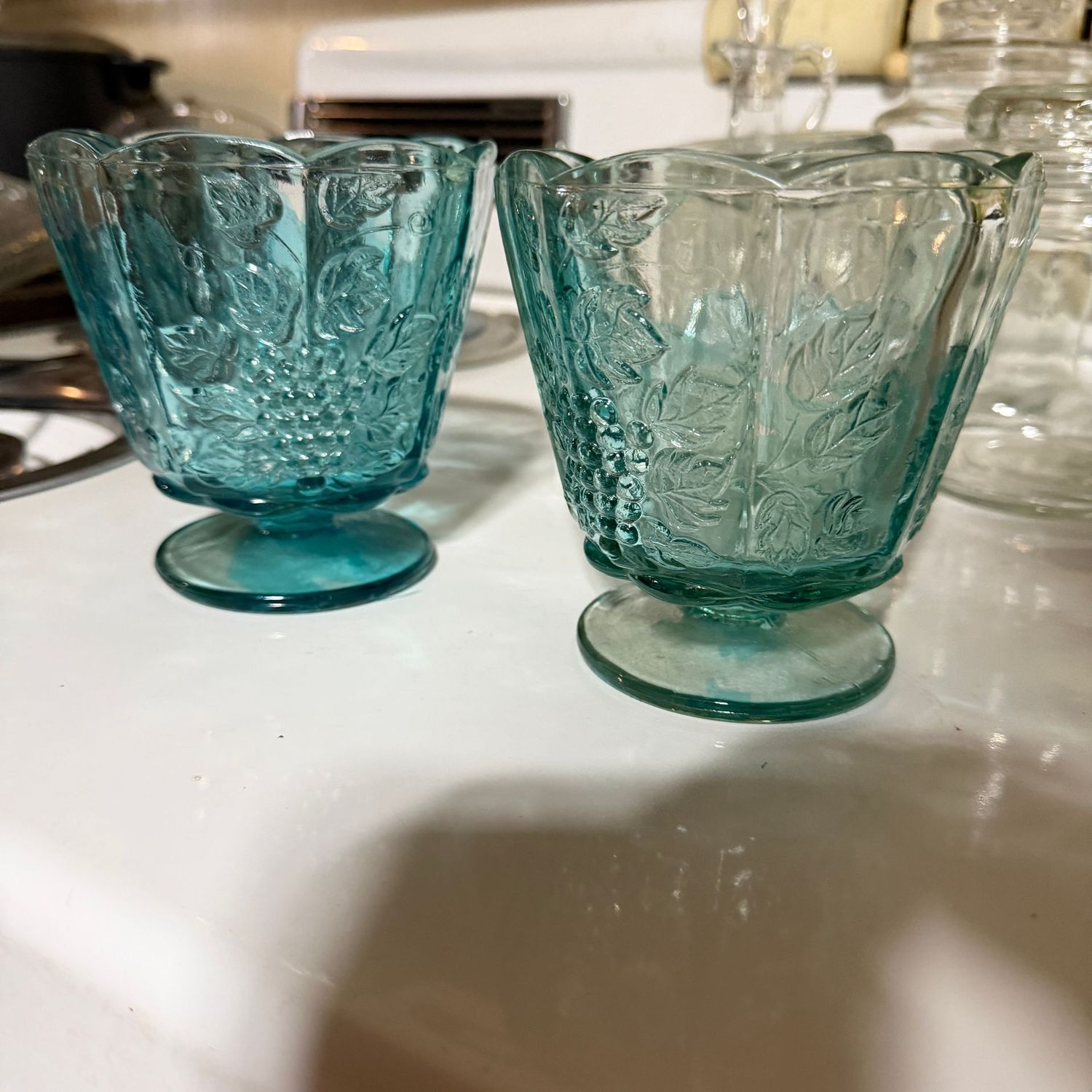 Vintage blue glass paneled grapes vases, 4"H