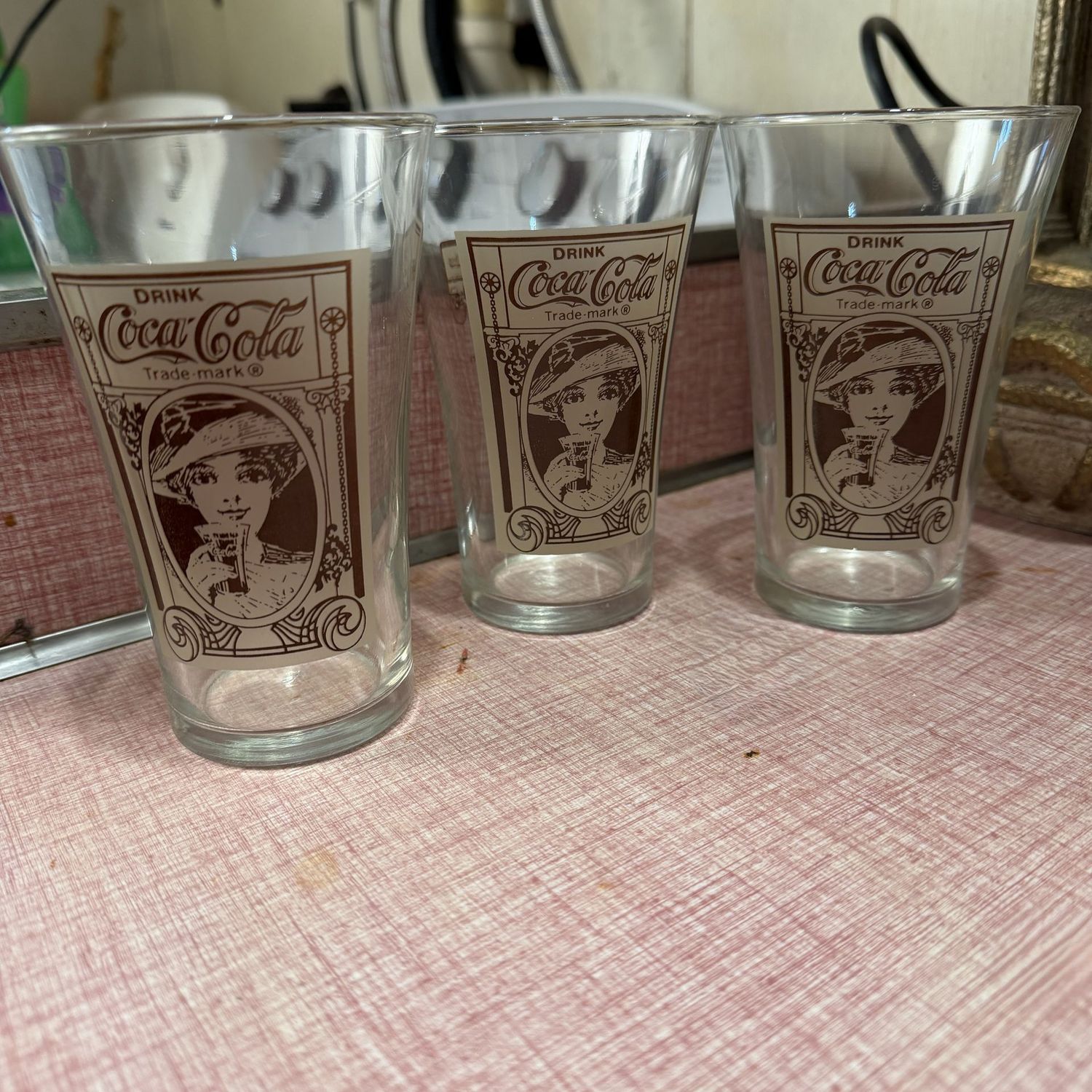 Group of three Drink Coca-Cola glasses