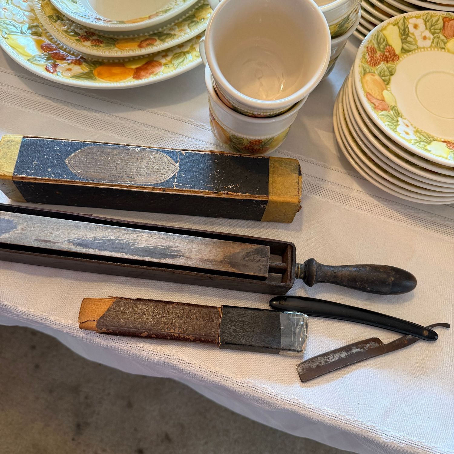 Vintage straight razor and double-sided sharpening tool