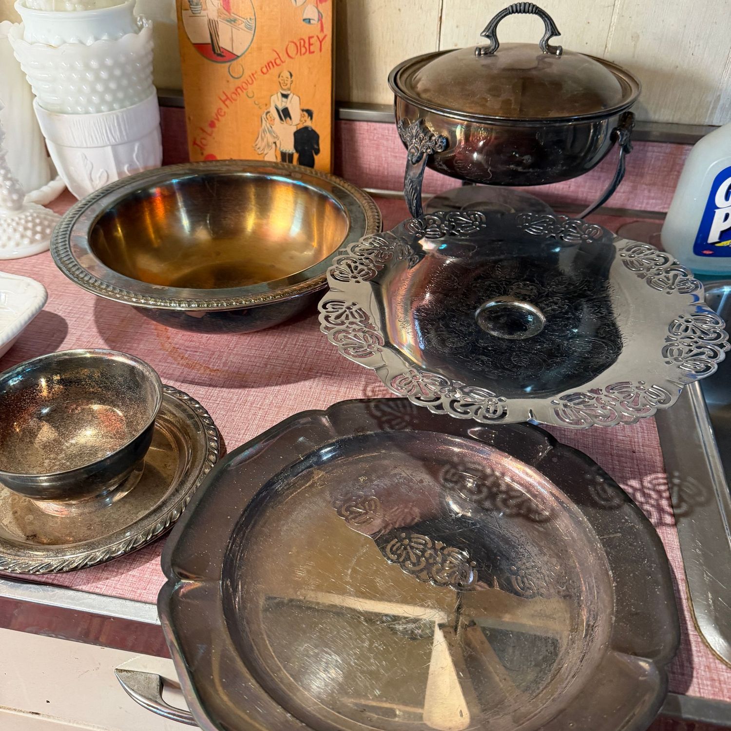 Group of silver-plated trays, servers, bowls, with the largest being 10"W