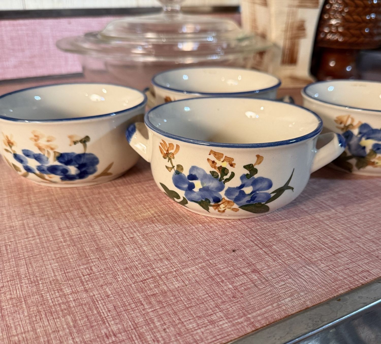 Group of 4 blue floral soup cups/bowls