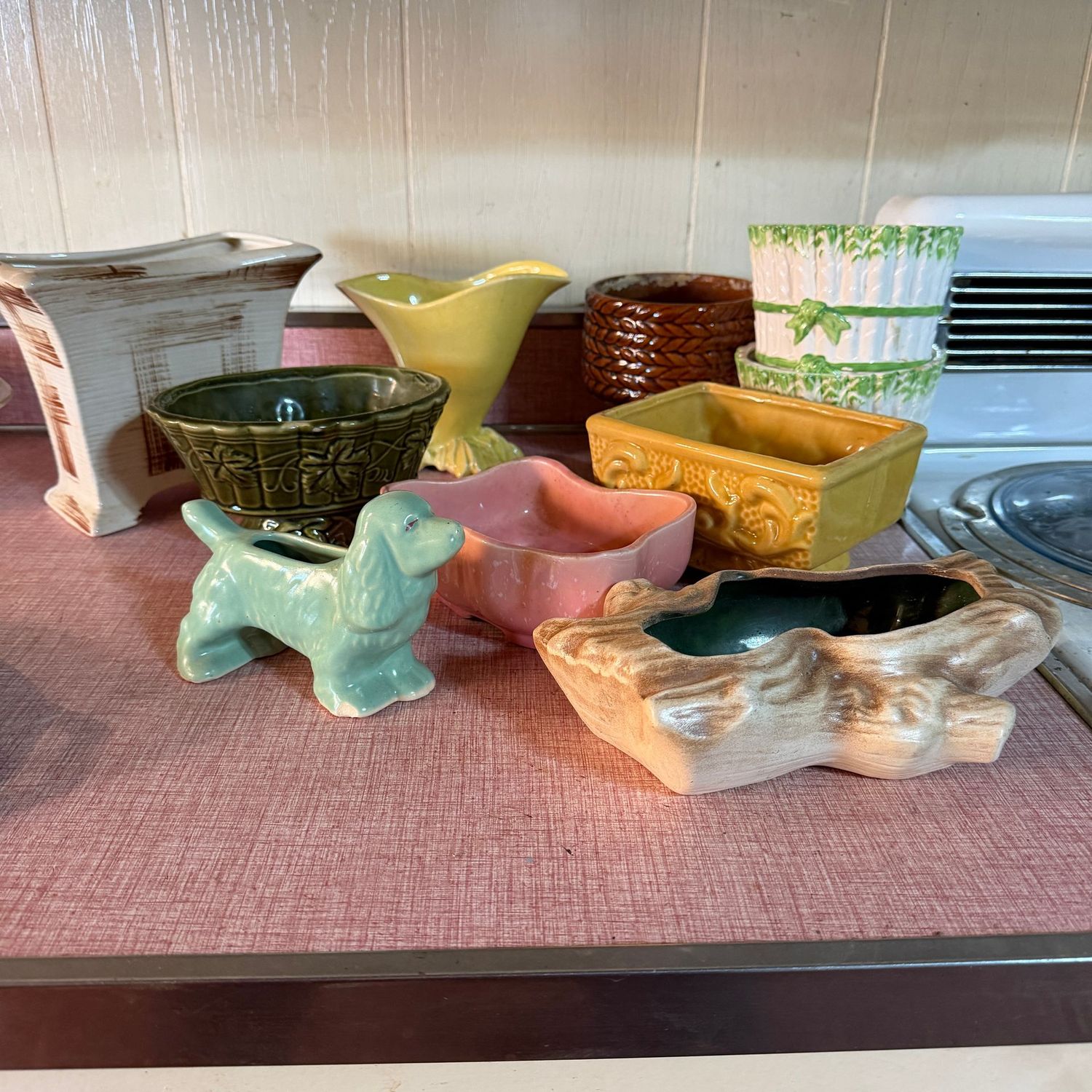 Group of vintage planters, the pink has a minor hairline, the others appear in good condition