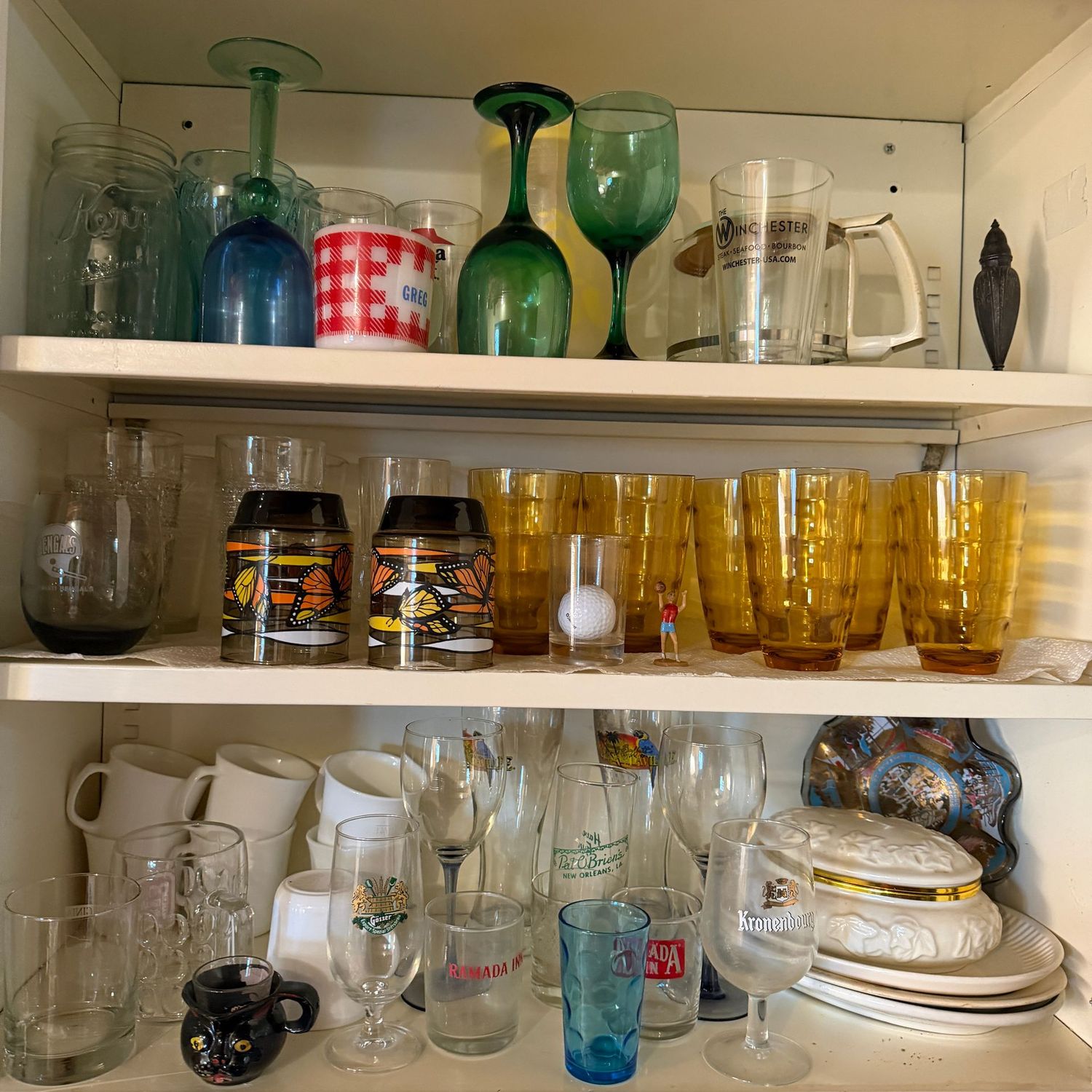 Cabinet contents with vintage glasses, coffee cups & more