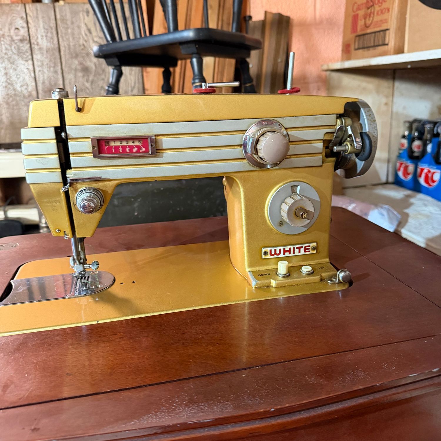 Vintage White brand sewing machine in table, appears in good condition, not tested (This item is heavy & in the Lower Level)