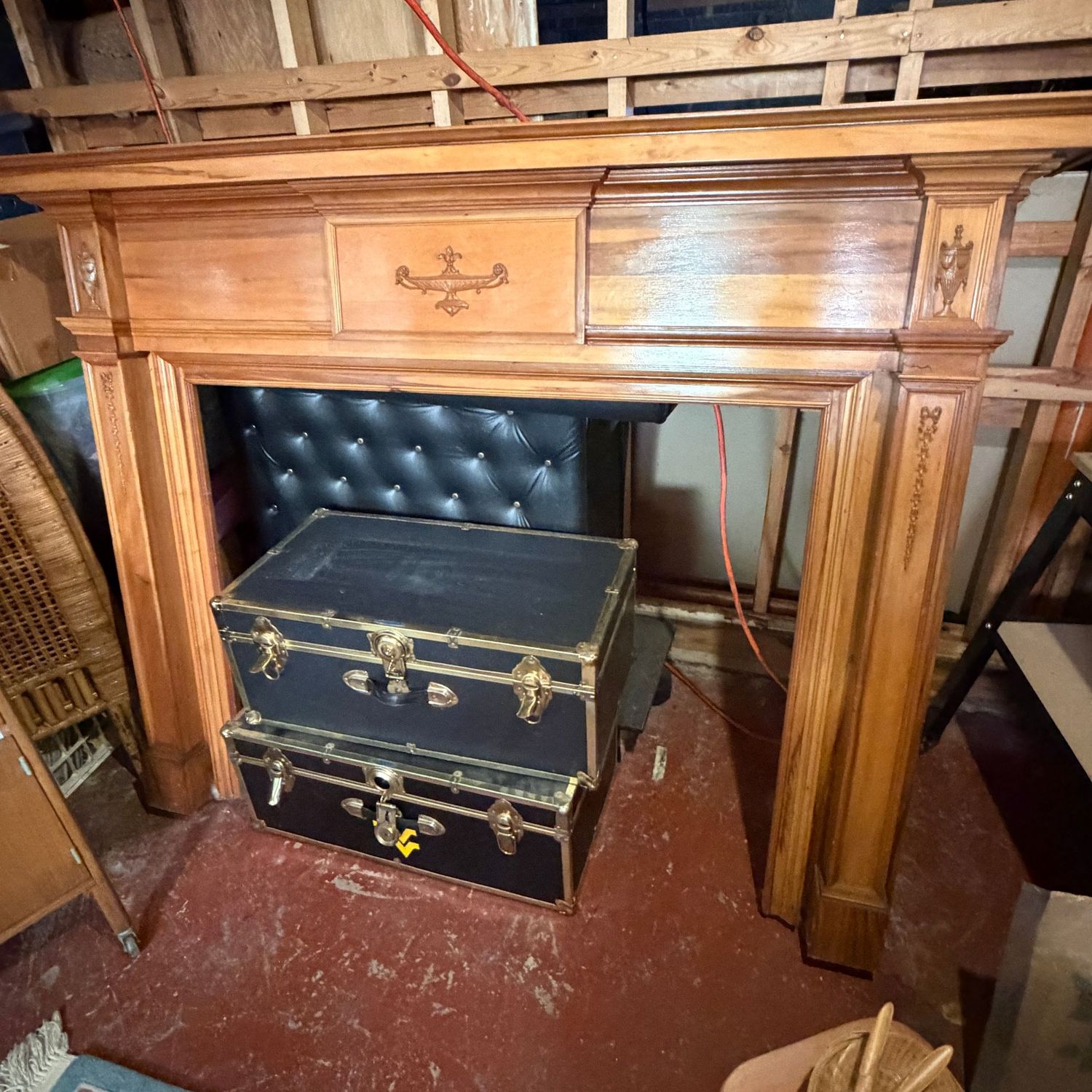 Beautiful solid wood fireplace mantle surround, needs a minor repair top right corner, opening is approx. 40"H x 47"W, whole height is 56" & 60"W (This item is heavy & in the Lower Level)