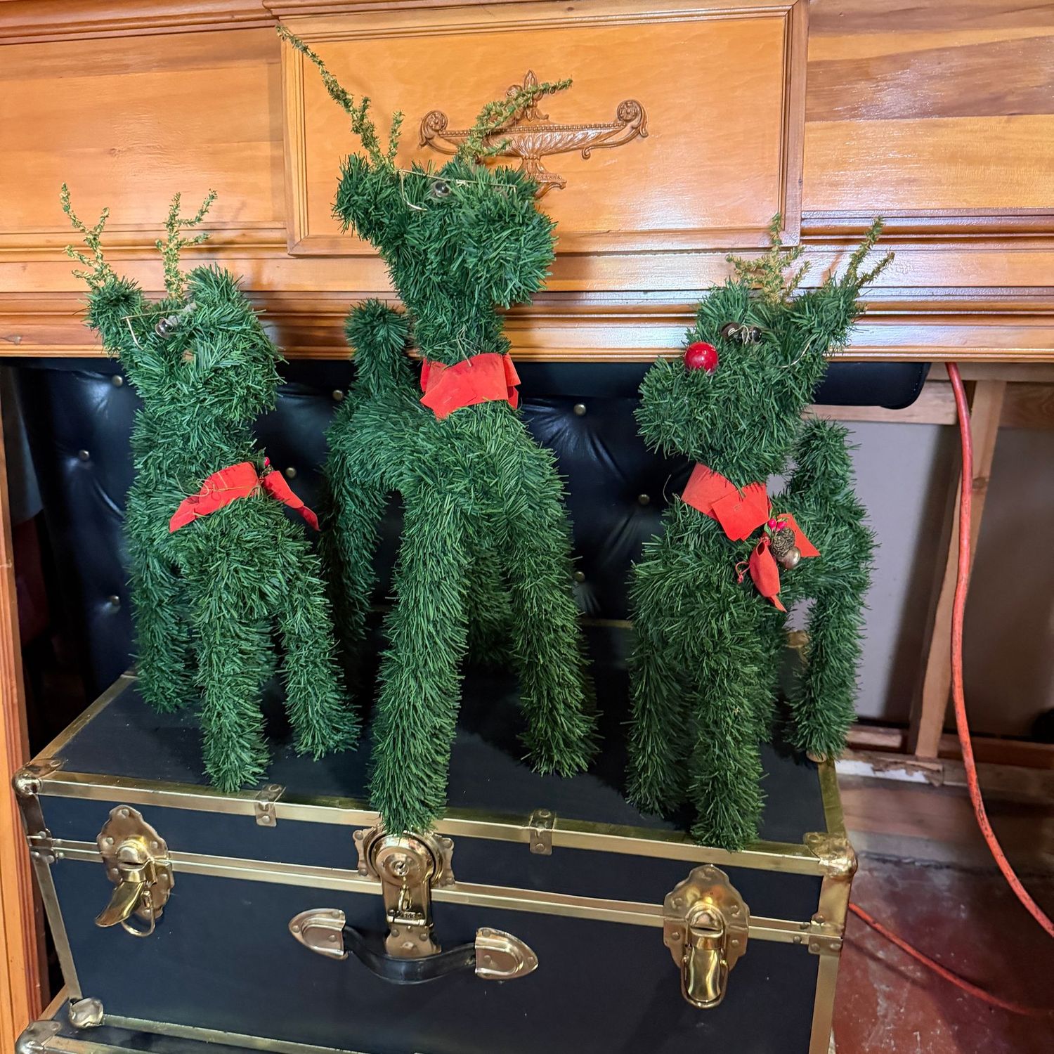 Reindeer decorations with wire construction and garland exterior, the tallest is 20"H