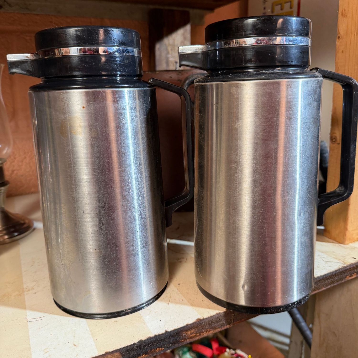 Two Thermique thermos coffee drink dispensers, appear in good condition, need some cleaning