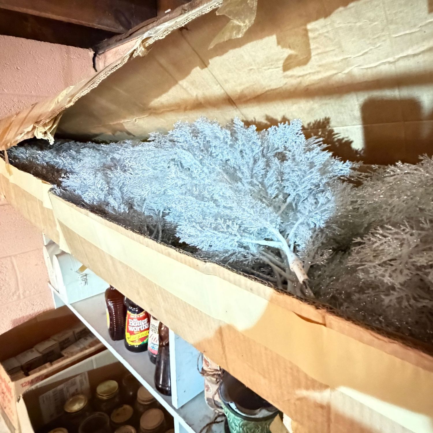 Mystery box with a vintage plastic glittered Christmas tree (likely 7'H) would be perfect for arrangements, box is 4'9"L (This item is heavy & in the Lower Level)