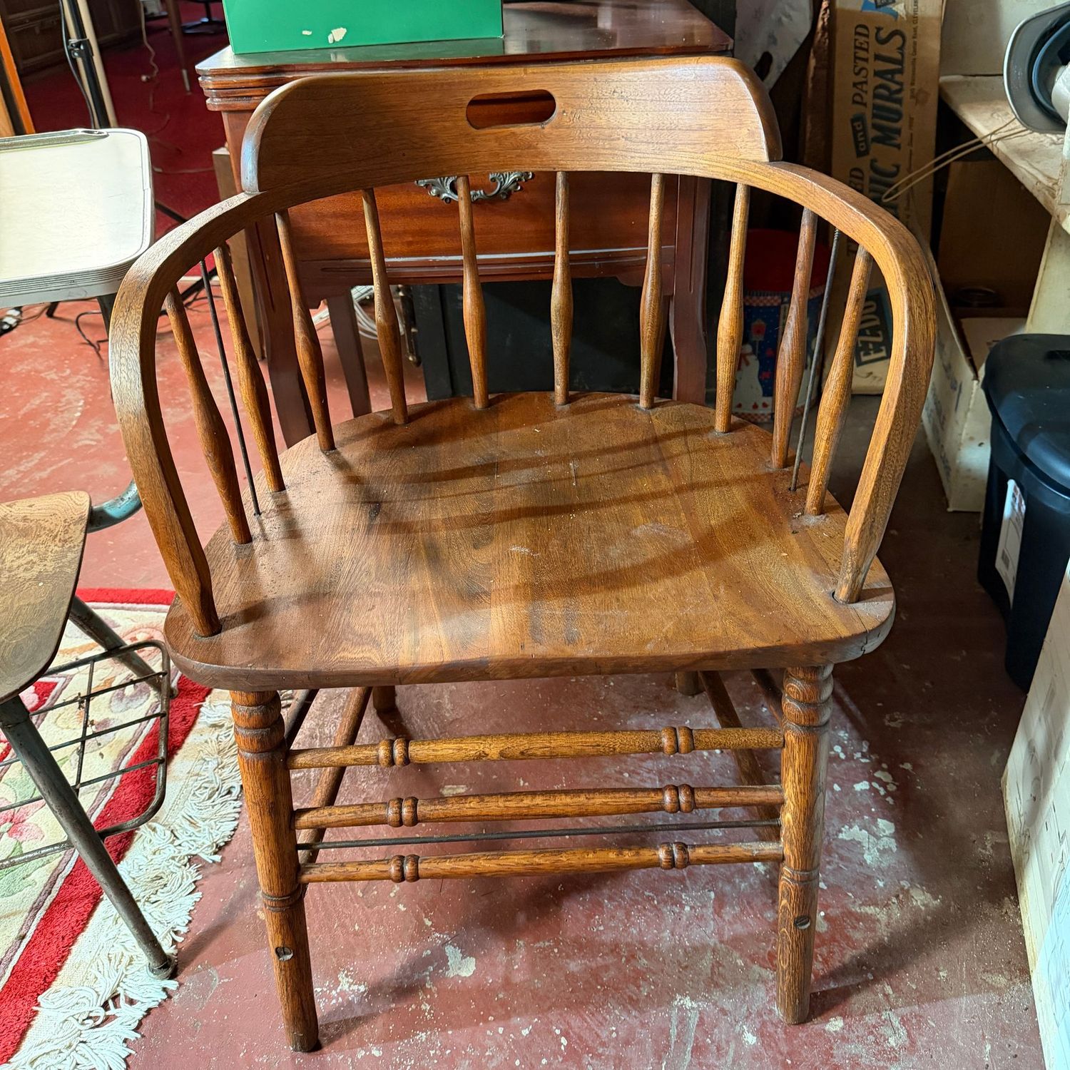 Solid wood chair with spindle back, curved arms, overall good condition, needs cleaning, 30"H x 21"W