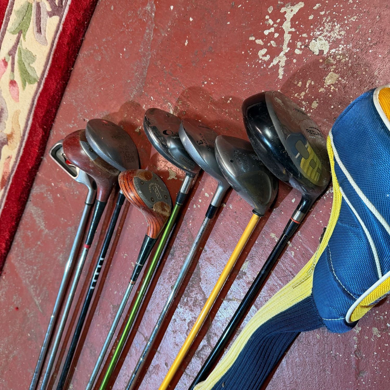 Group of golf clubs, right-handed, mostly drivers