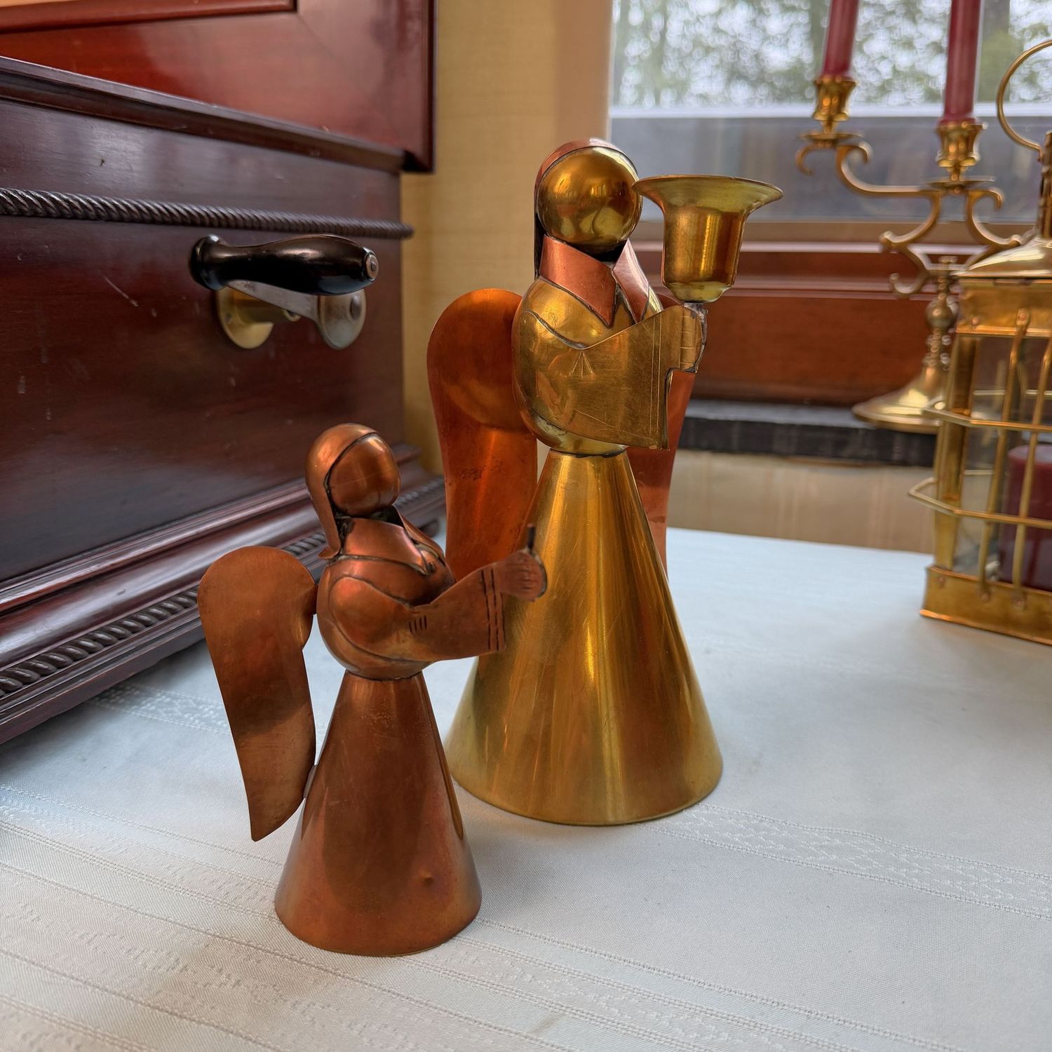 Two brass and copper angels, the smallest is missing a wing, the tallest is 9 Two brass and copper angels, the smallest is missing a wing, the tallest is 9"H