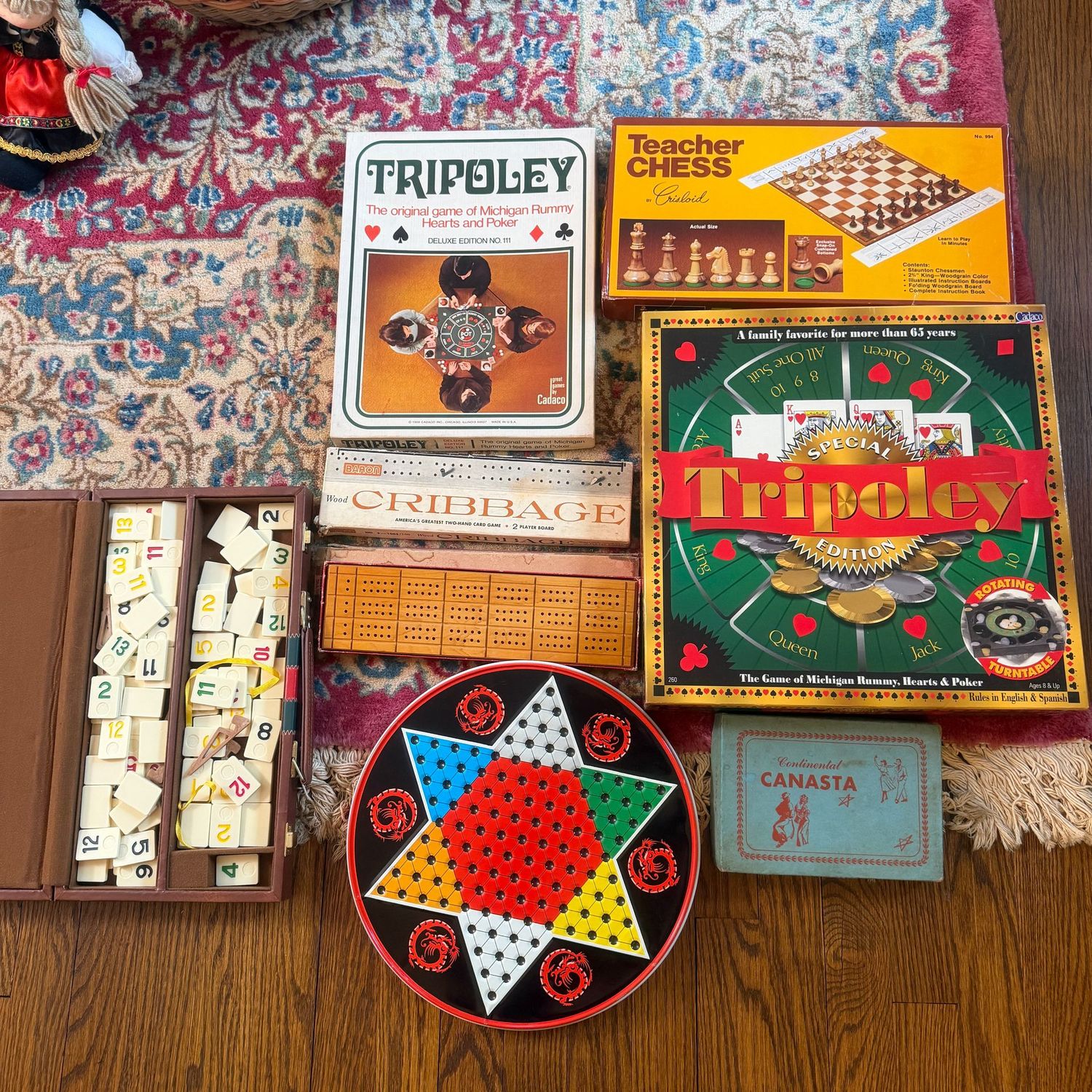 Group of vintage games including chess, tripoly and cribbage Group of vintage games including chess, tripoly and cribbage