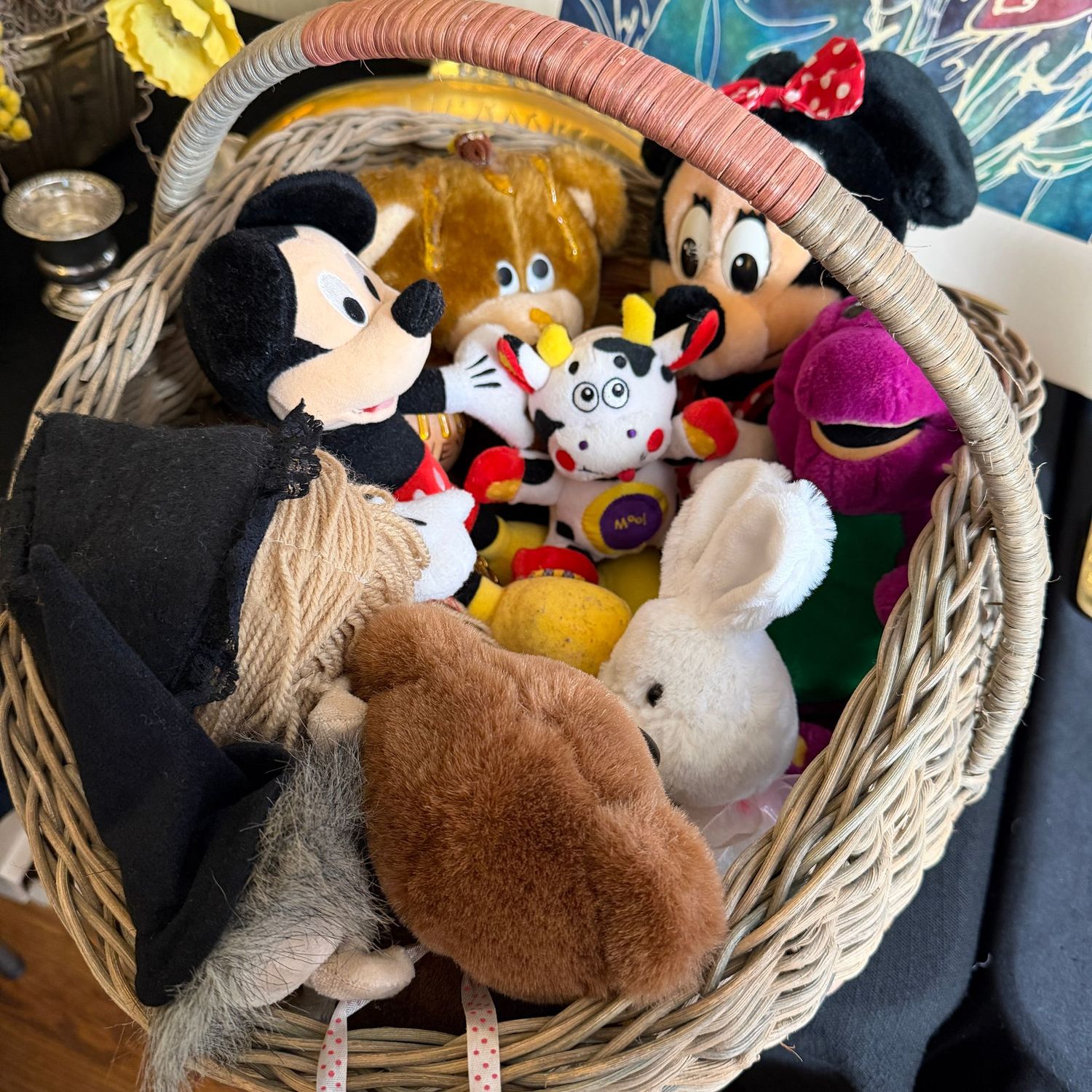 Large basket of plush animals and toys, basket is 16"L