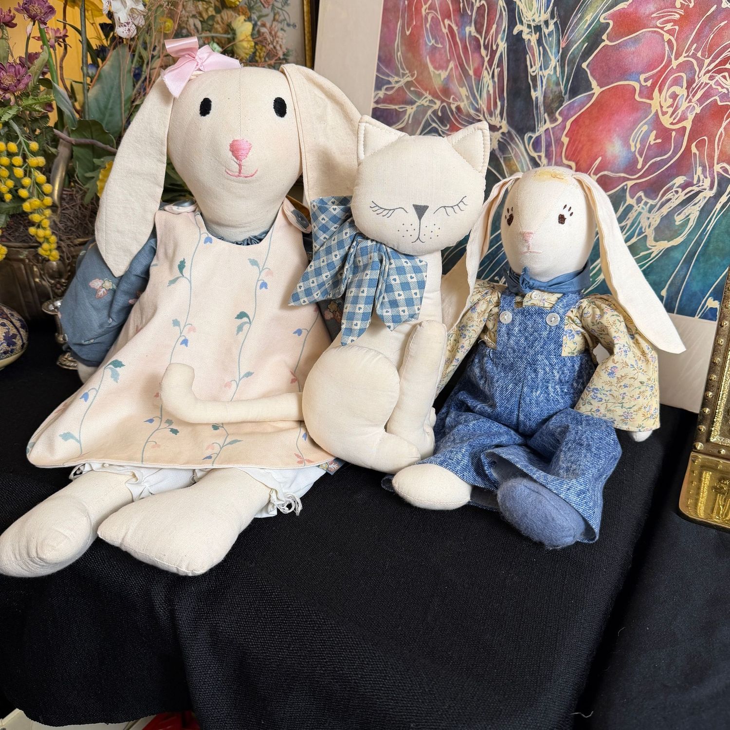 Blue and white bunny rabbits and cat, one rabbit is missing a bow, very minor wear otherwise, the tallest is 20"