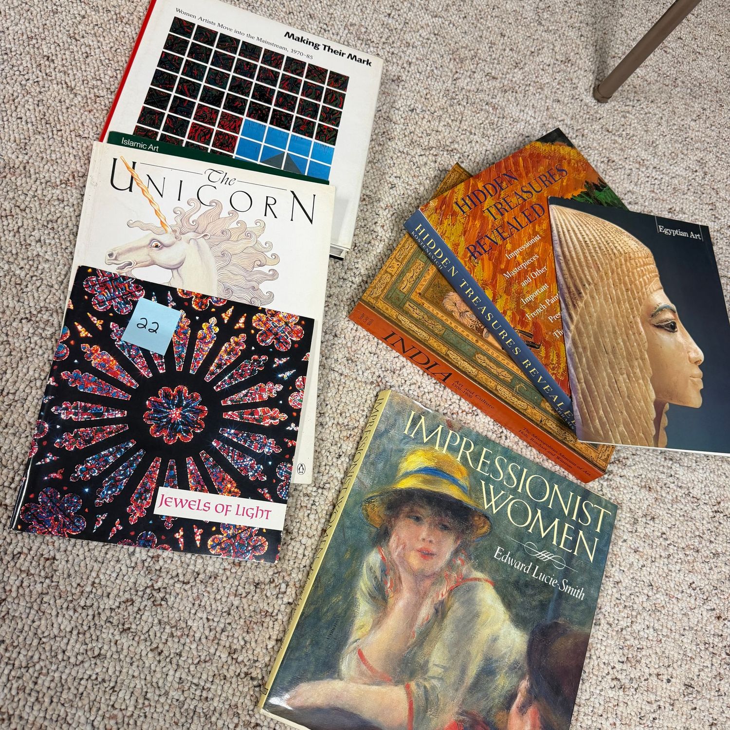 Book lot #22, including Hidden Treasures Revealed, Impressionist Woman, and Jewels of Light