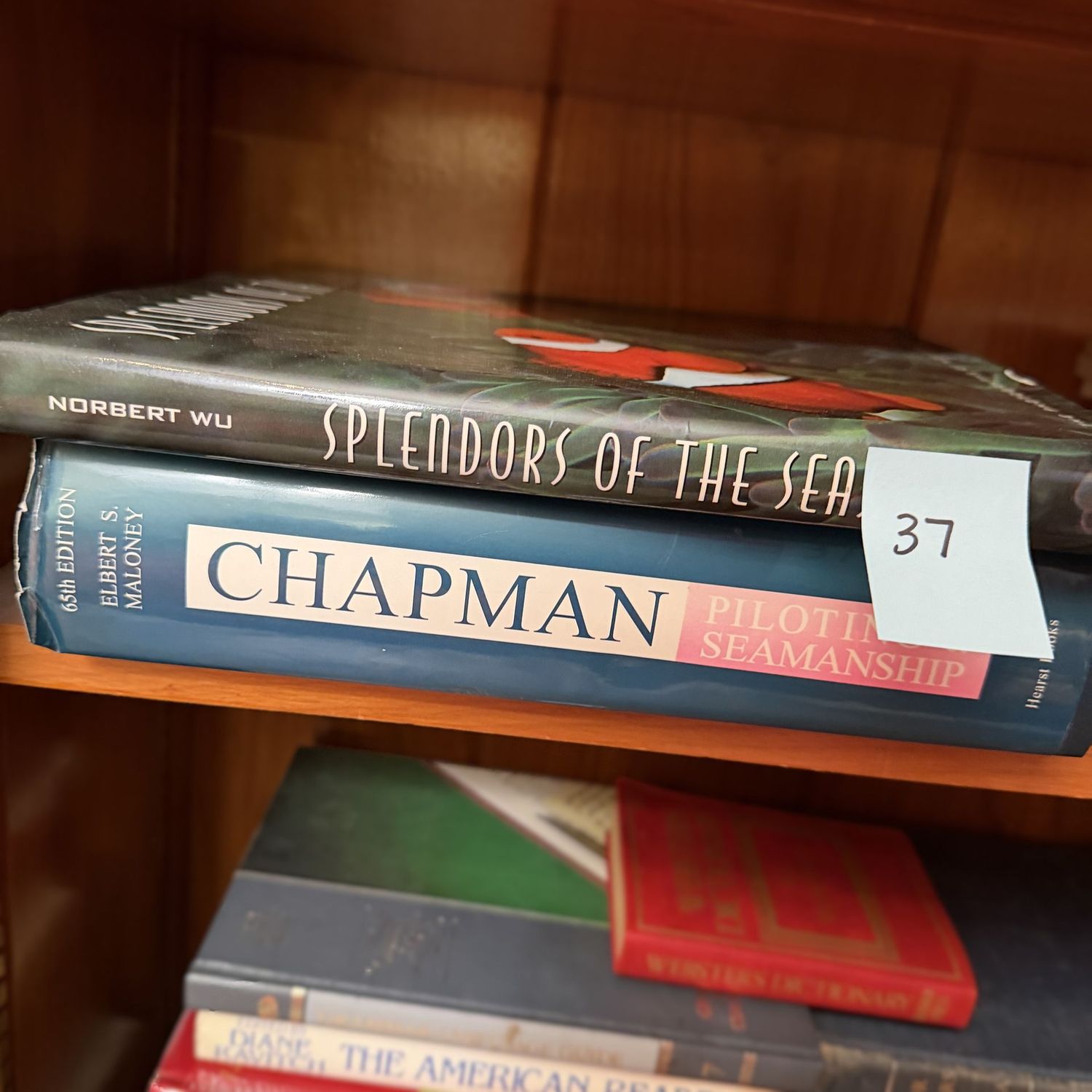 Book lot #37, large books Piloting Seamanship, Splendors of the Sea