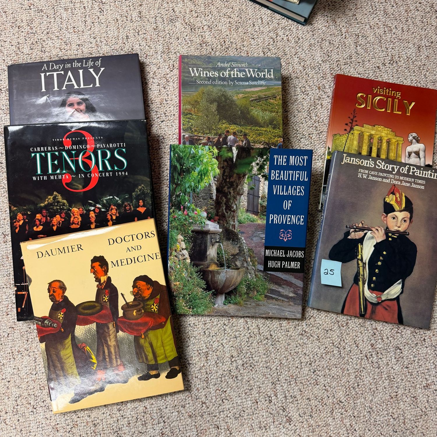 Book lot #25, including Three Tenors, Wines of the World, Janson's Story of Painting