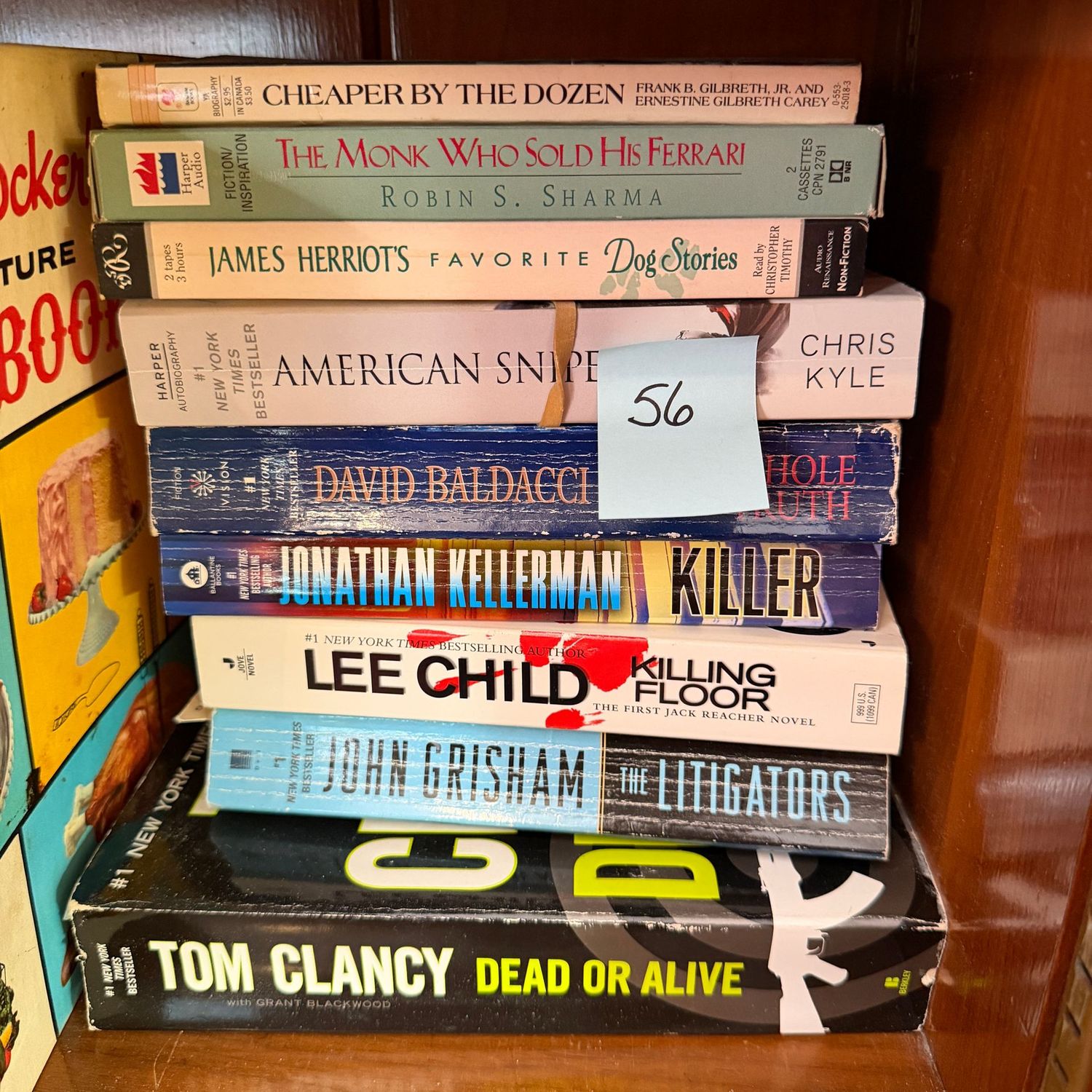 Book lot #56, including Cheaper by the Dozen, Tom Clancy
