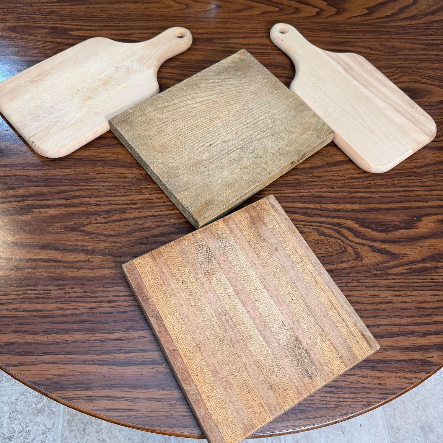 Group of 4 wood cutting boards, some wear, lartest is 9x11