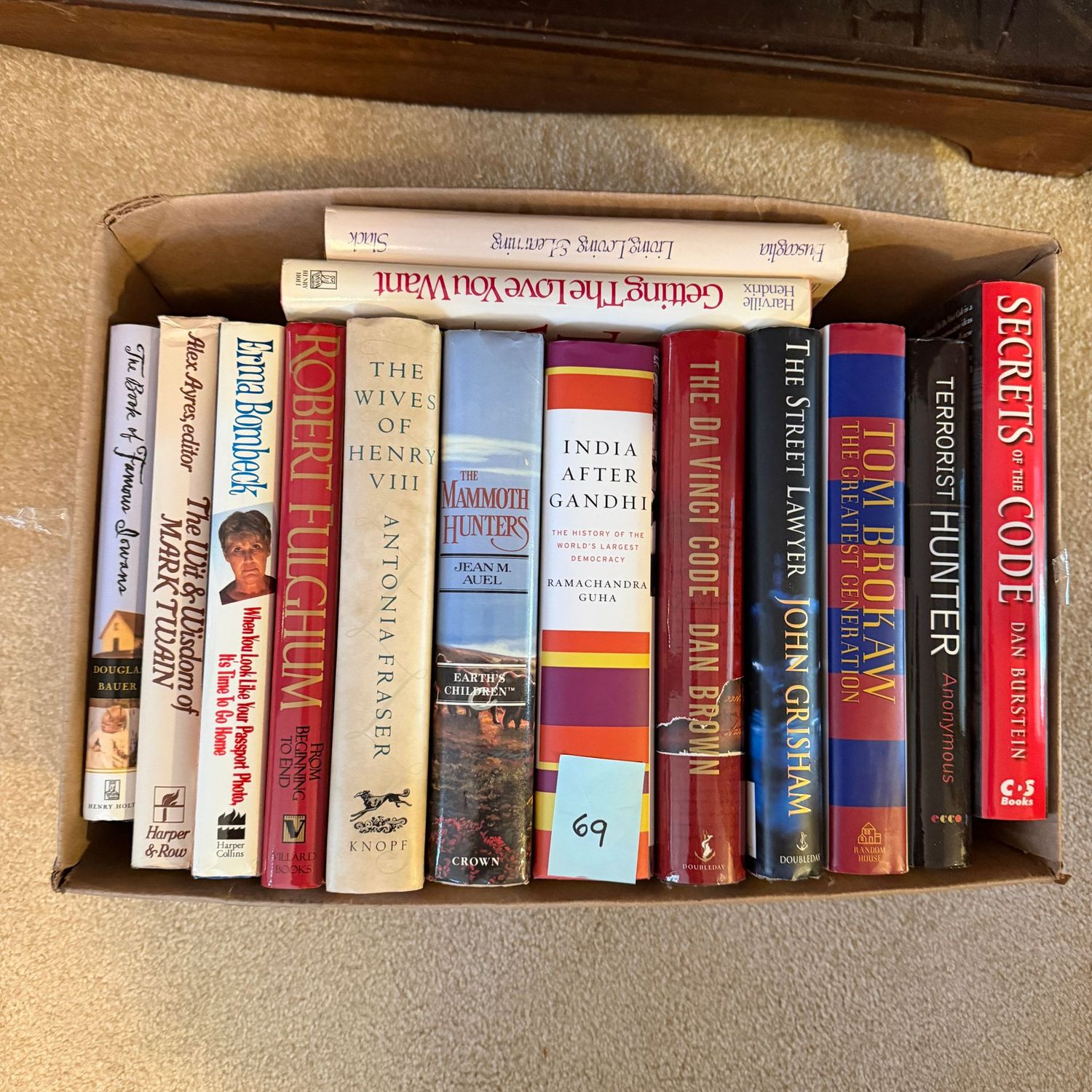 Book lot #69, including The Wives of Henry VIII, Mammoth Hunters, Secrets of the Code