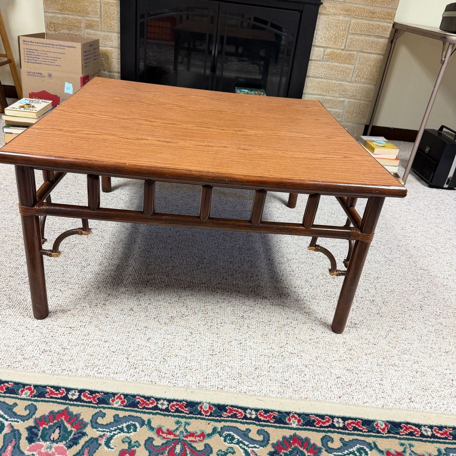 Vintage bamboo coffee, cocktail table, overall nice condition except for fraying on the edges of the wrapped decorative leg supports, 16"H x 32"W (This item is in the lower level)
