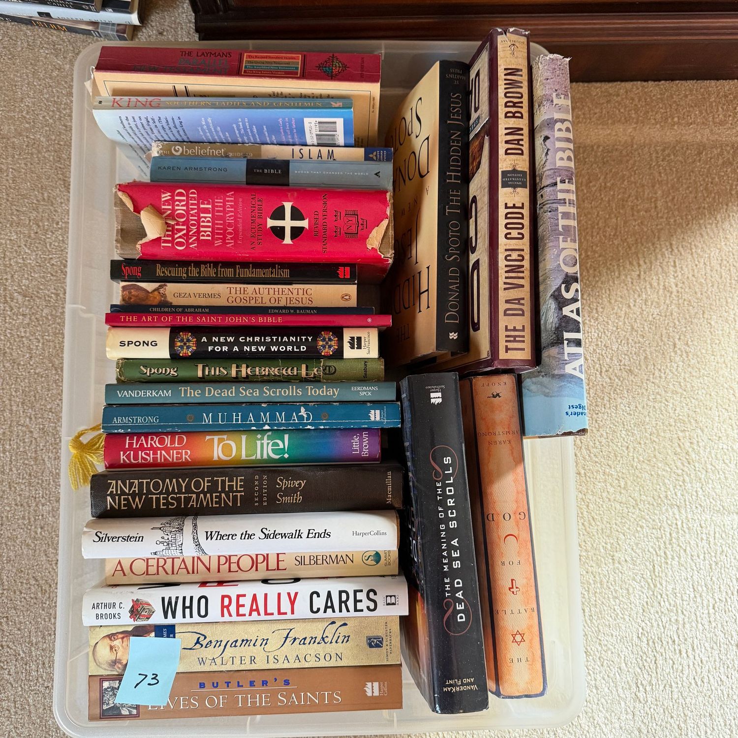 Book lot #73, including Atlas of the Bible, Lives of the Saints, The Dead Sea Scrolls Today