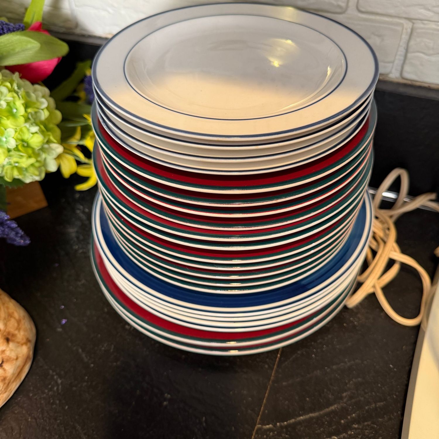 Stack of stoneware dinner and salad, lunch plates