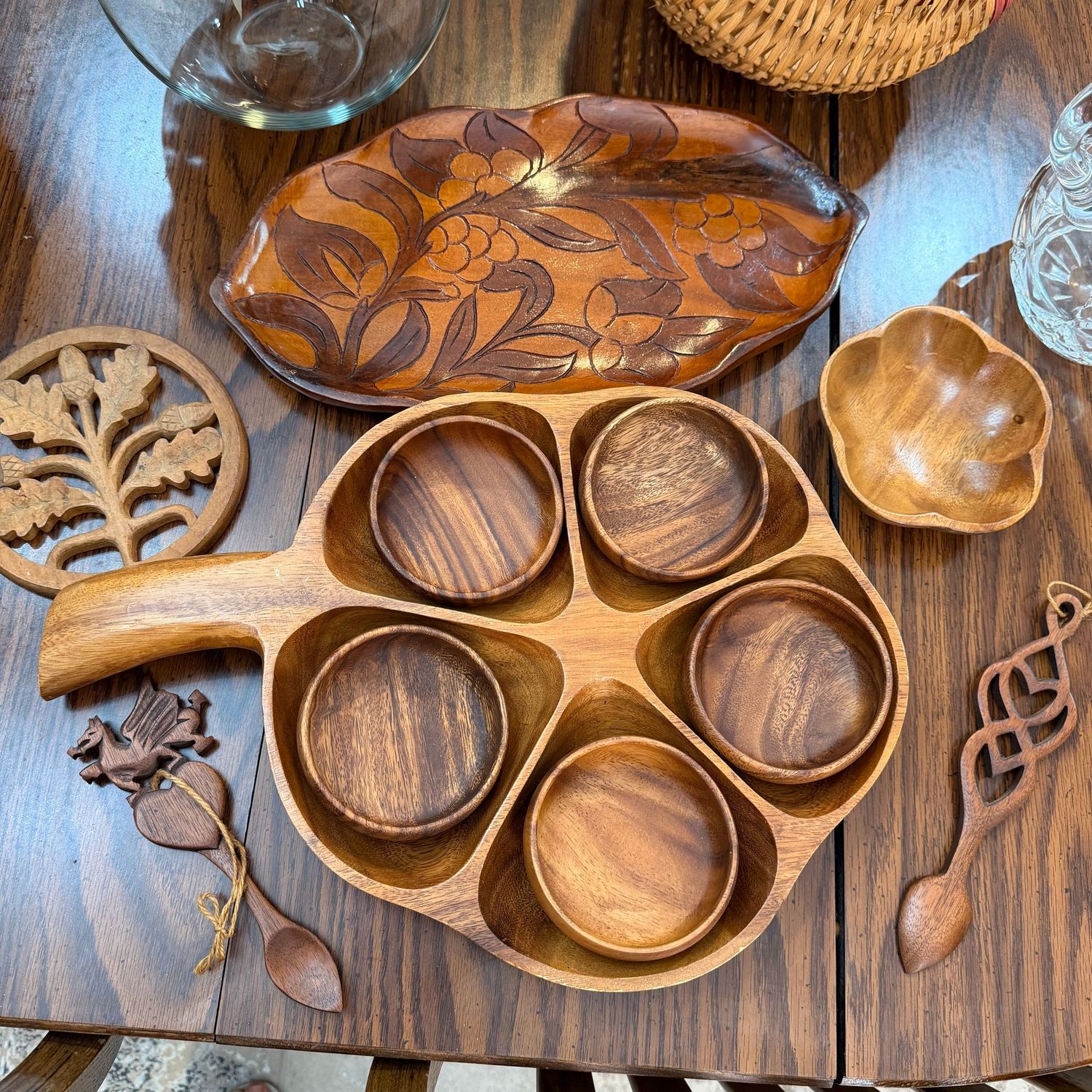 Group of wooden serving & decorative pieces, including a 16"L divided dish with handle and removable bowls