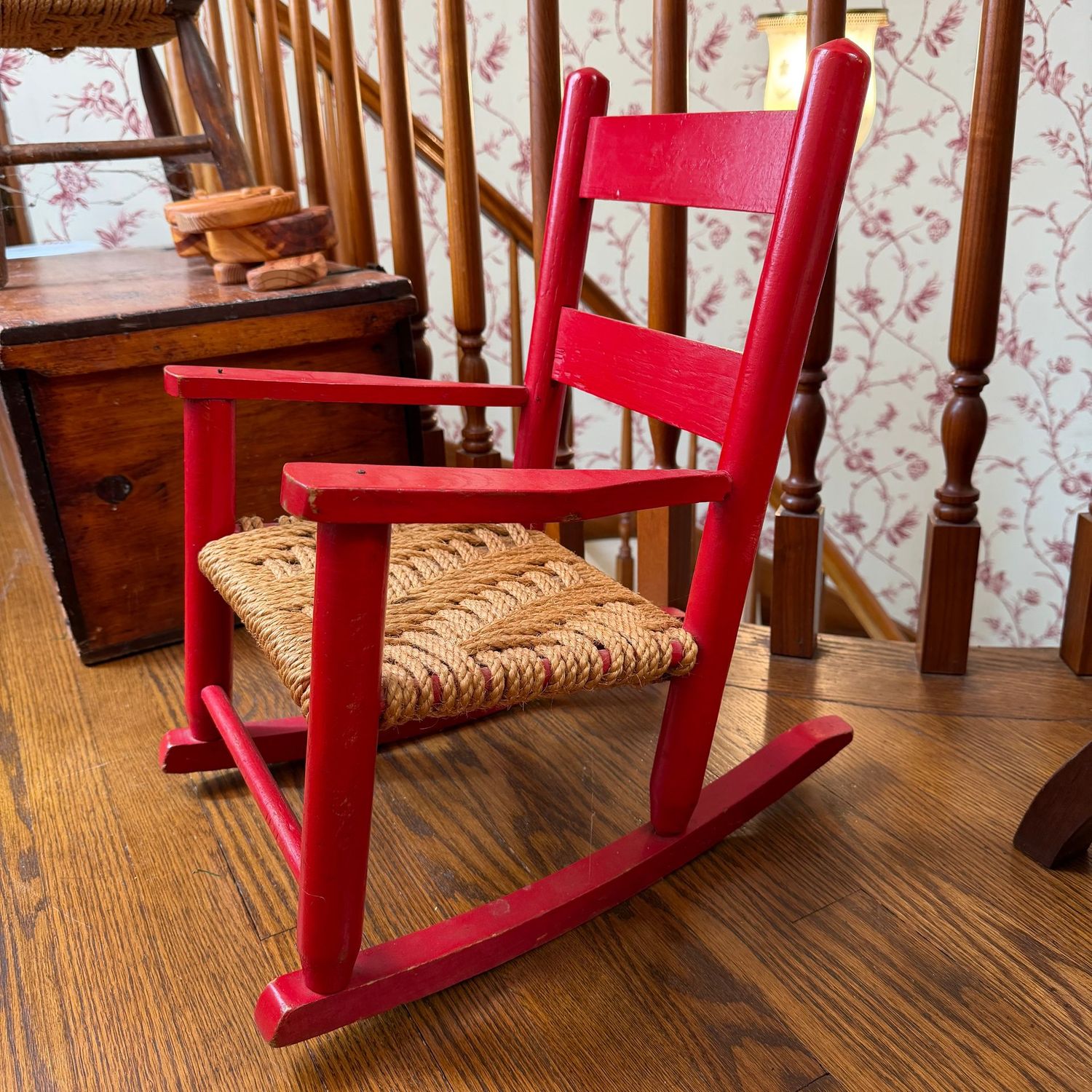 Red vintage child's rocker with rope seat, nice condition, 19"H x 13"W
